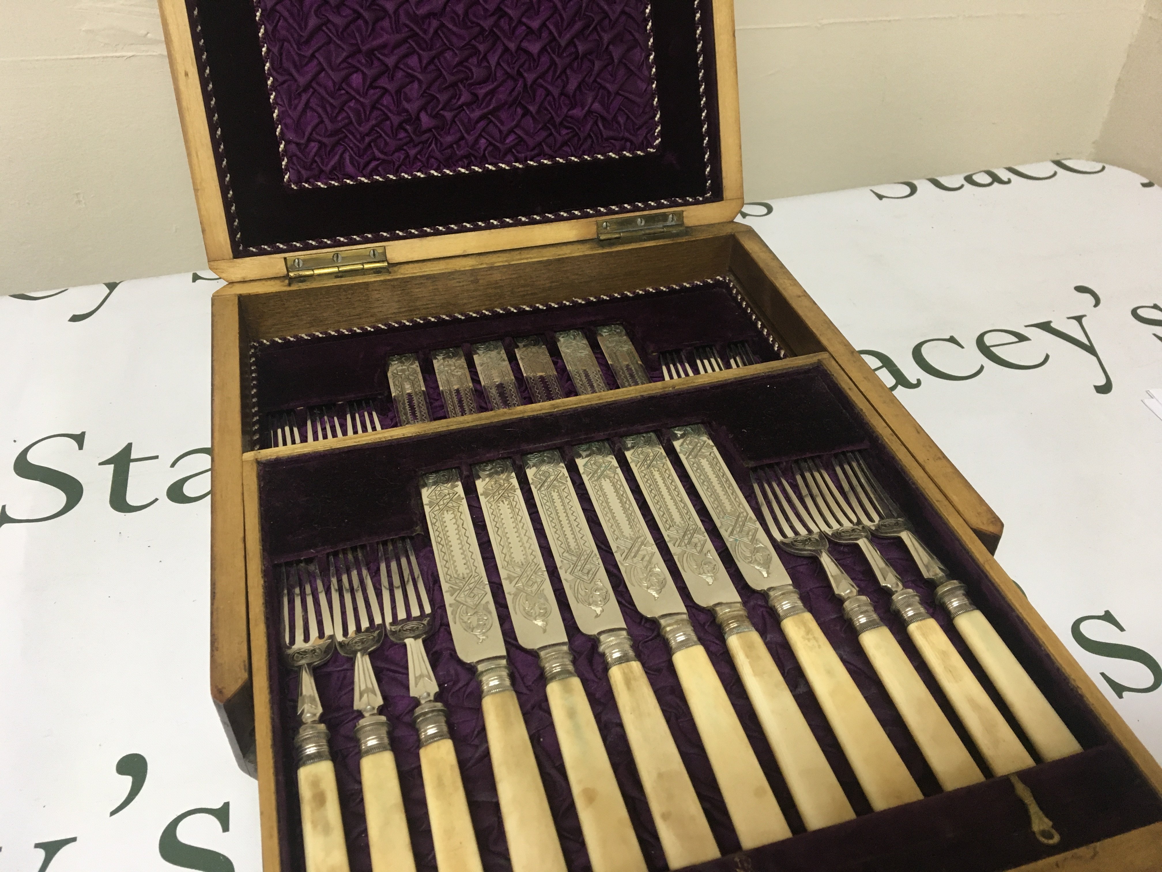 A canteen of early 20th century silver plated cutlery and other conforming serving cutlery. NO RESERVE