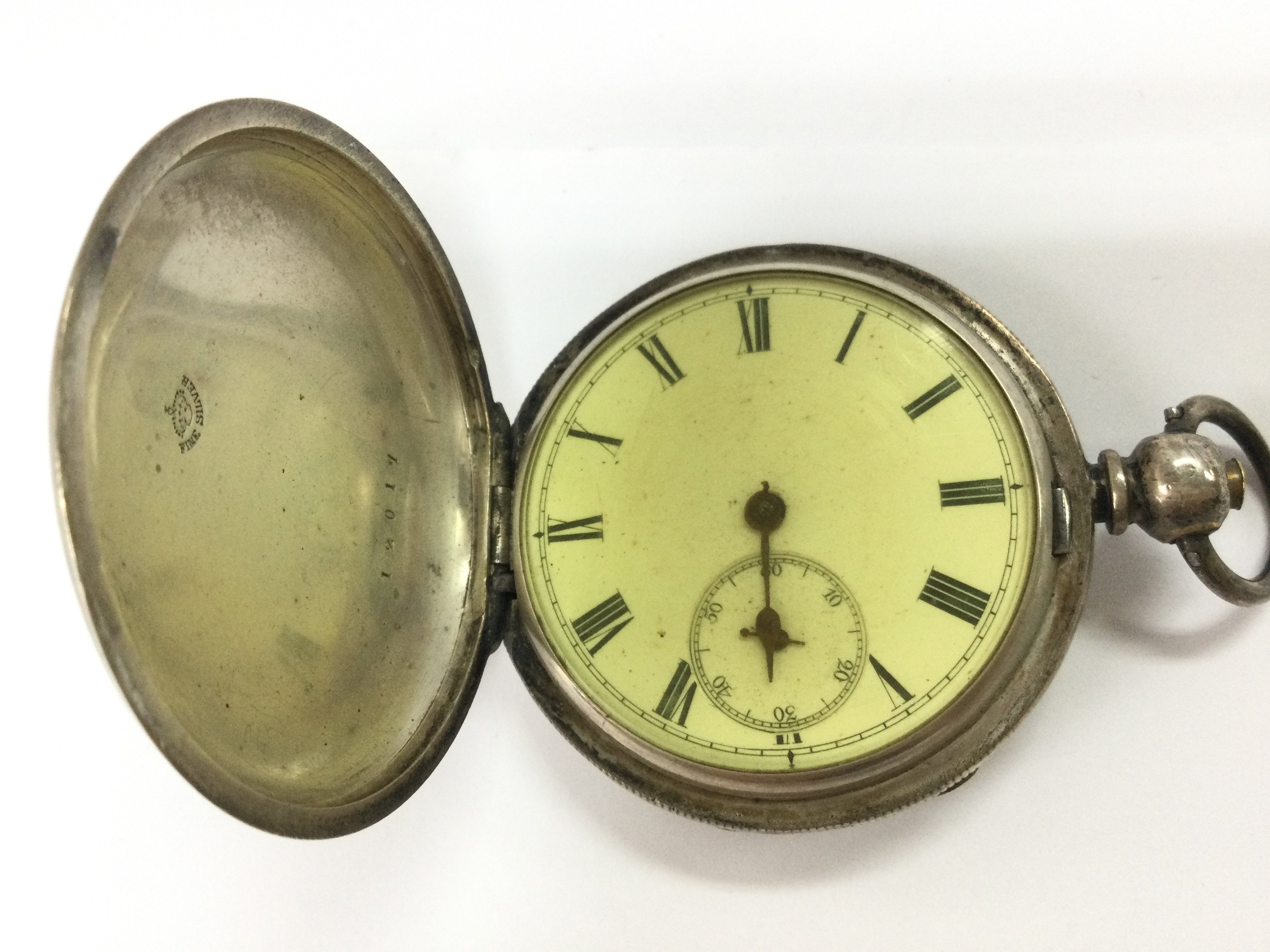 A silver cased hunter pocket watch. Not seen running.