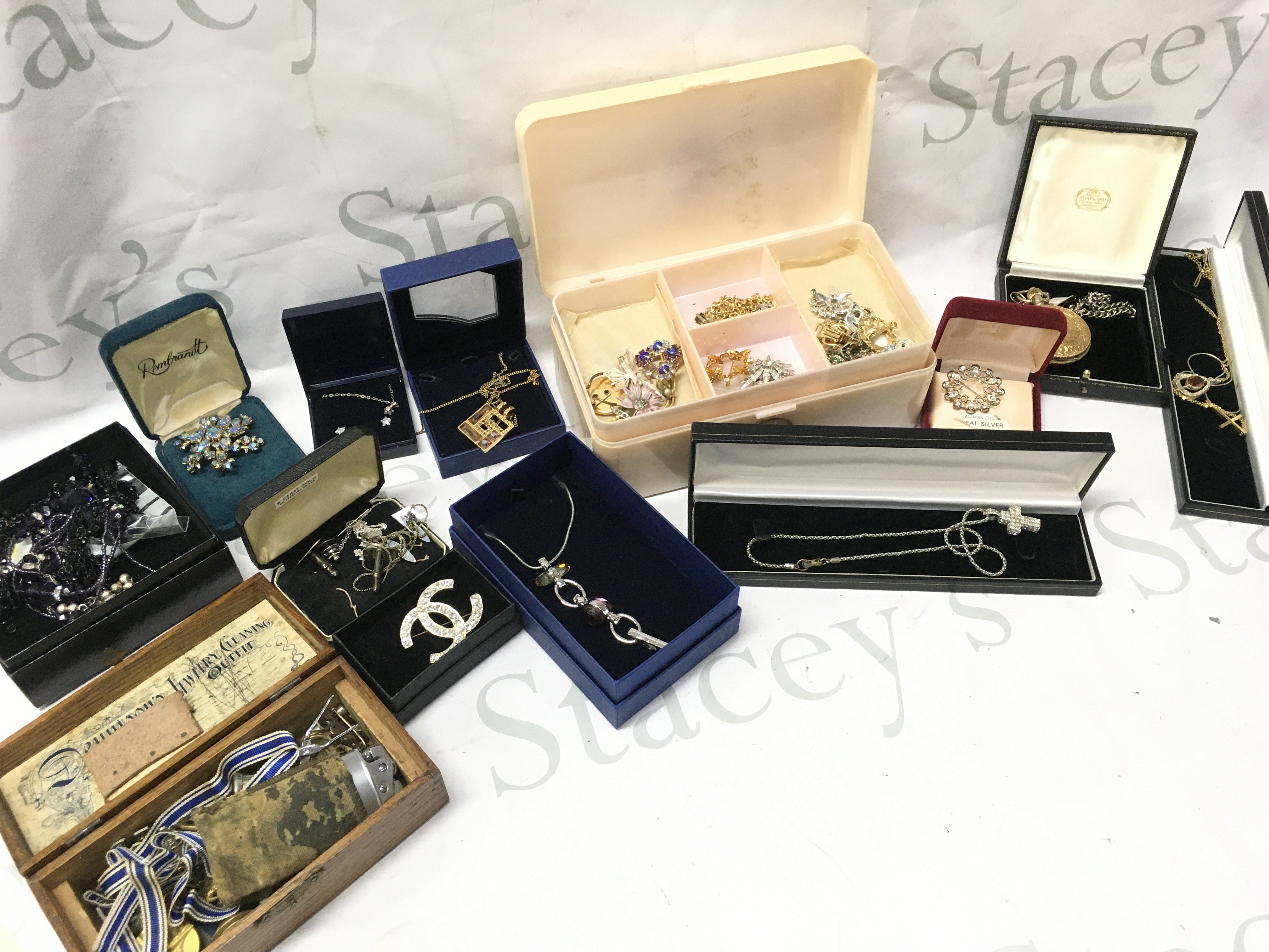 A mixed collection of costume Jewellery including silver Jewellery, boxed Swarovski necklace Etc