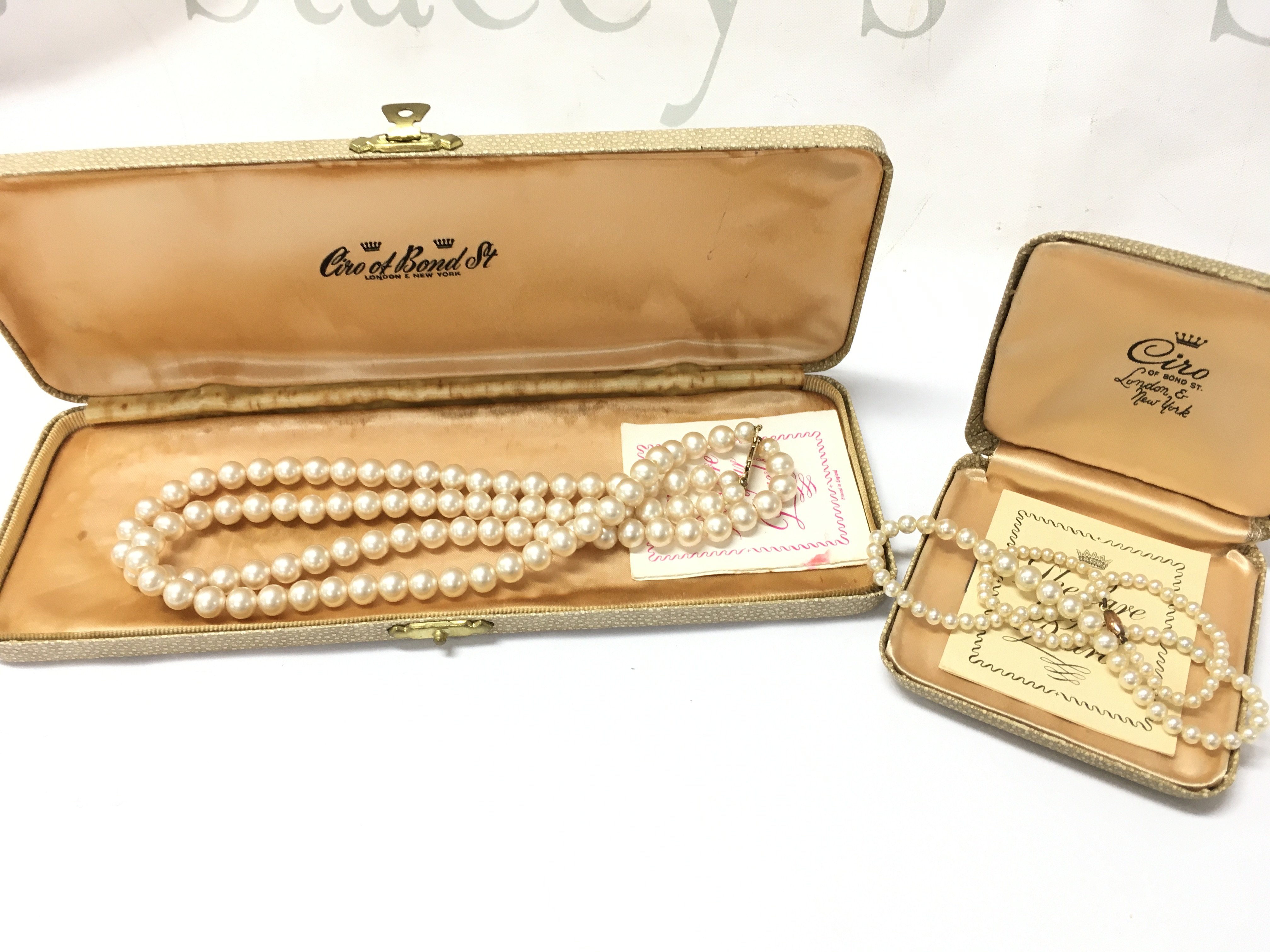 Boxed Ciro cultured pearl gold mounted necklaces