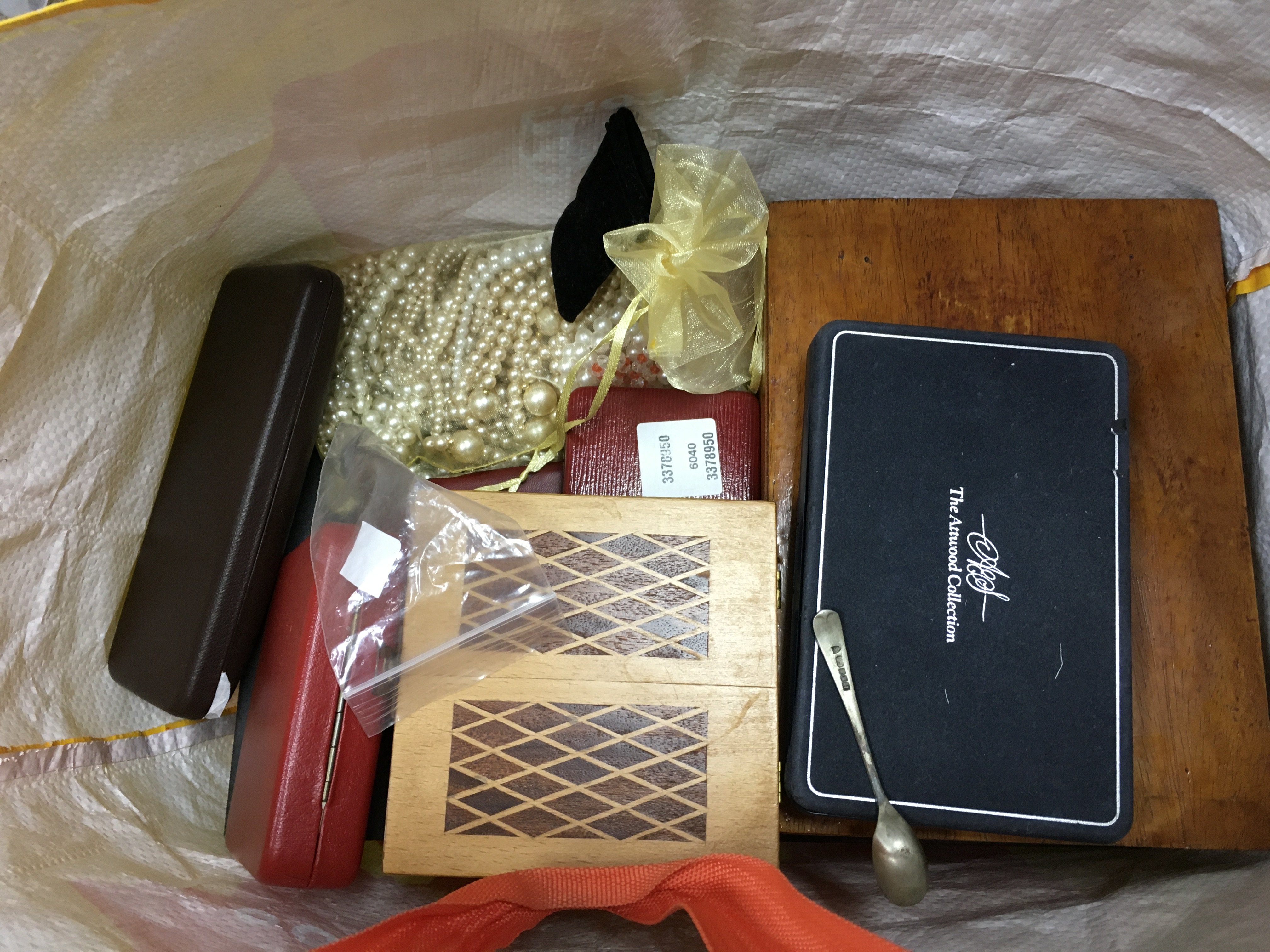 A mixed collection of costume jewellery including necklaces, brooches etc