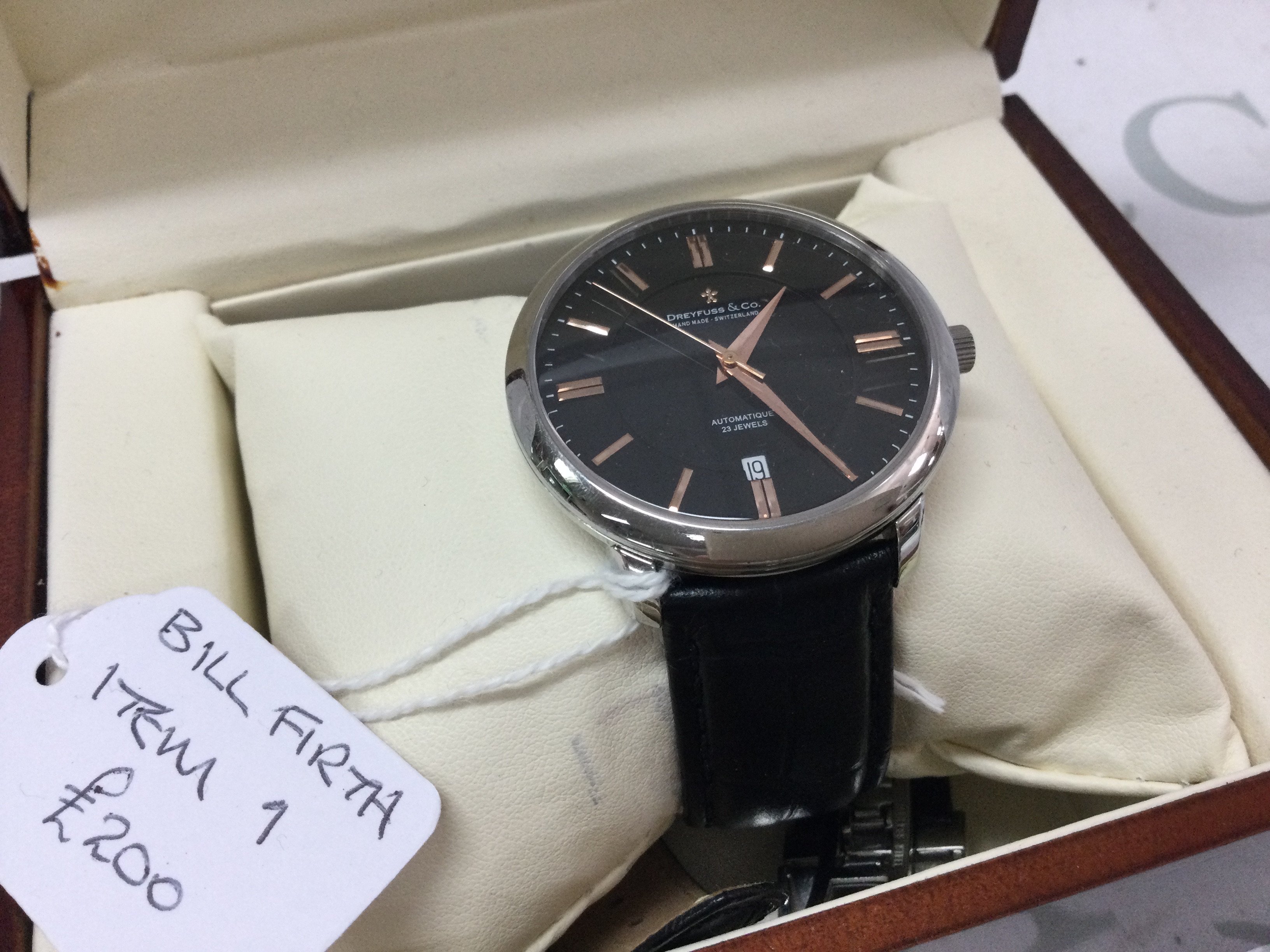 A Dreyfus Swiss Gents wristwatch with 23 jewel automatic movement and date, original strap, (working). Postage cat a