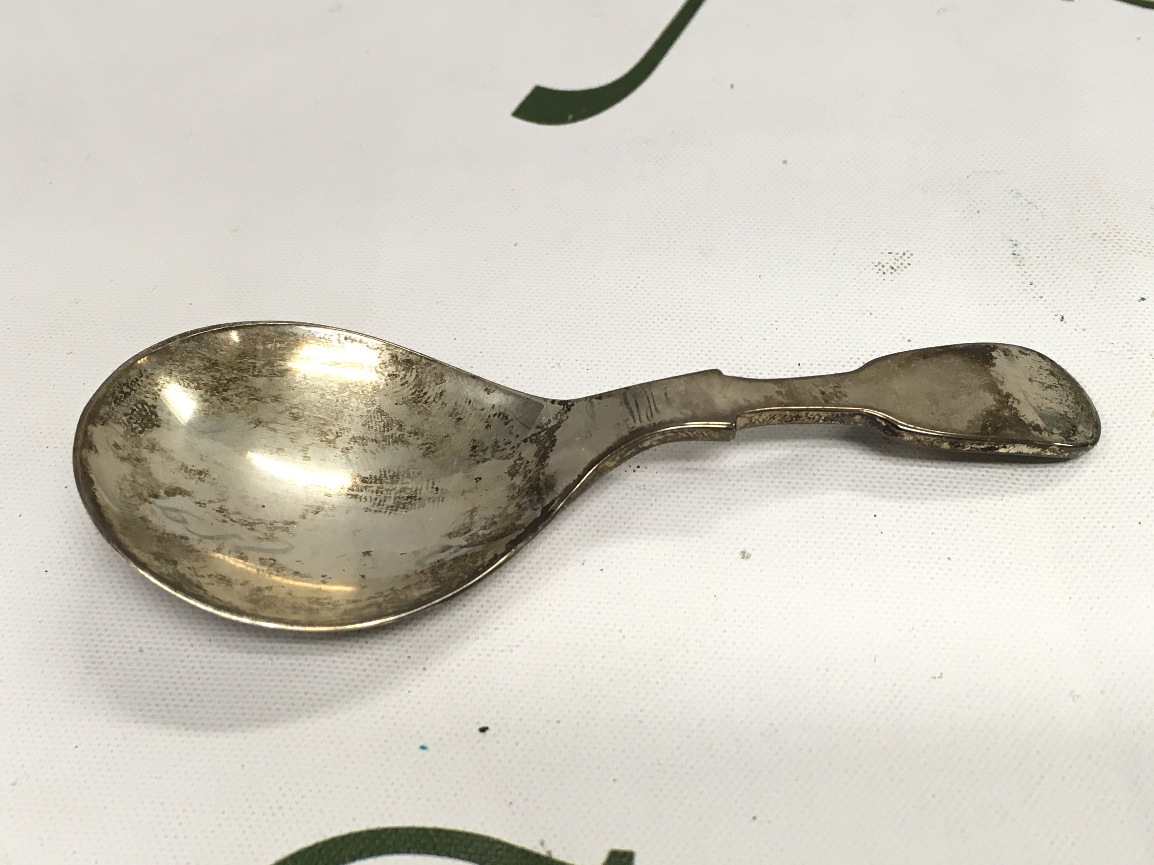 A silver hallmarked caddy spoon.