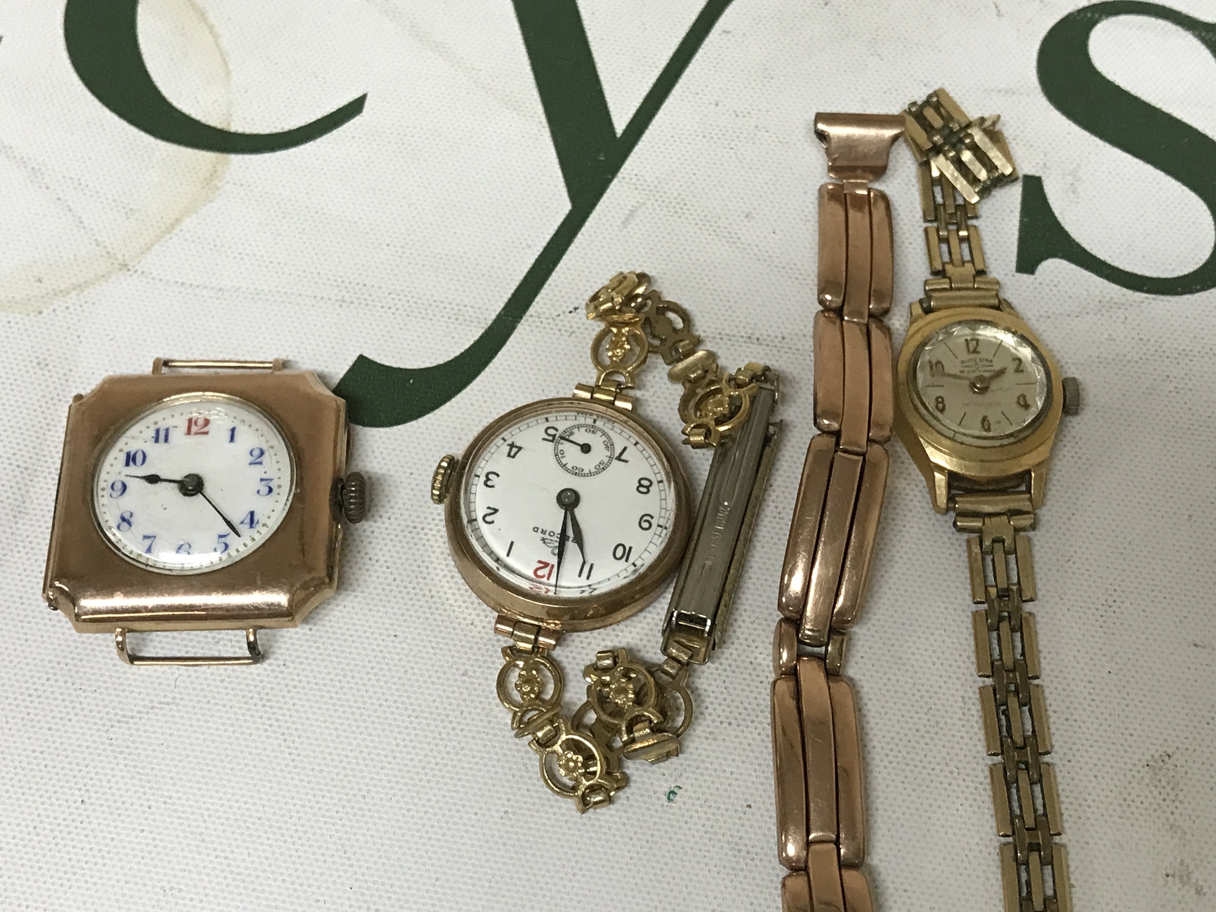 Three wrist watches including 9 ct gold .