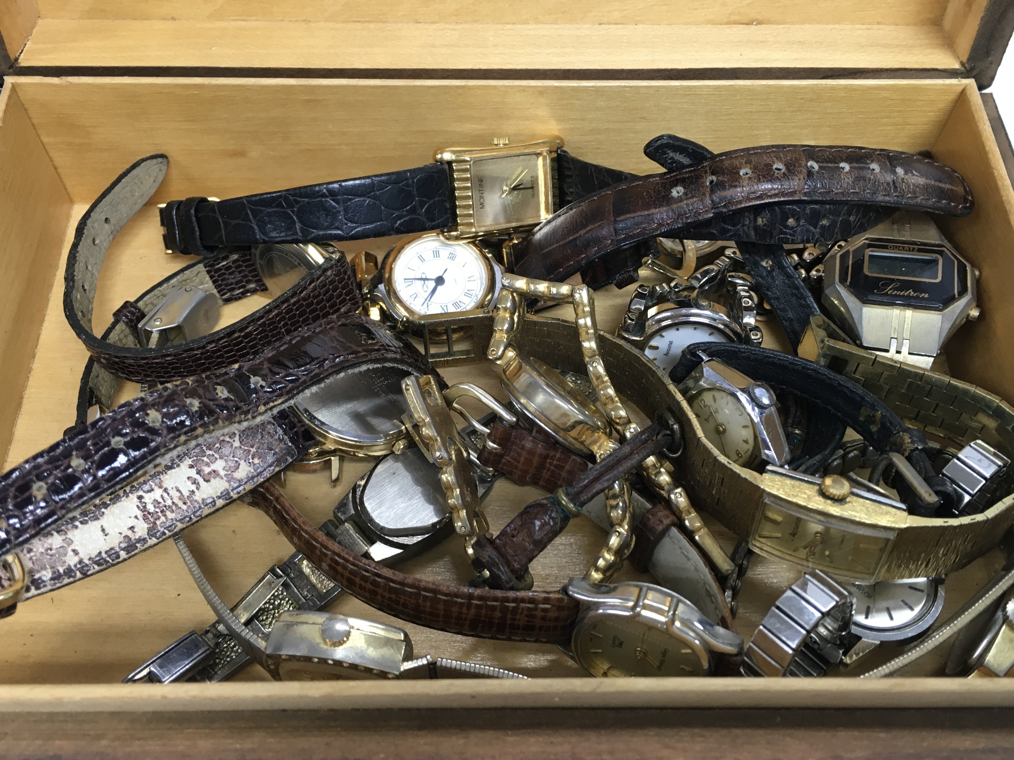 A box of ladies vintage watches.