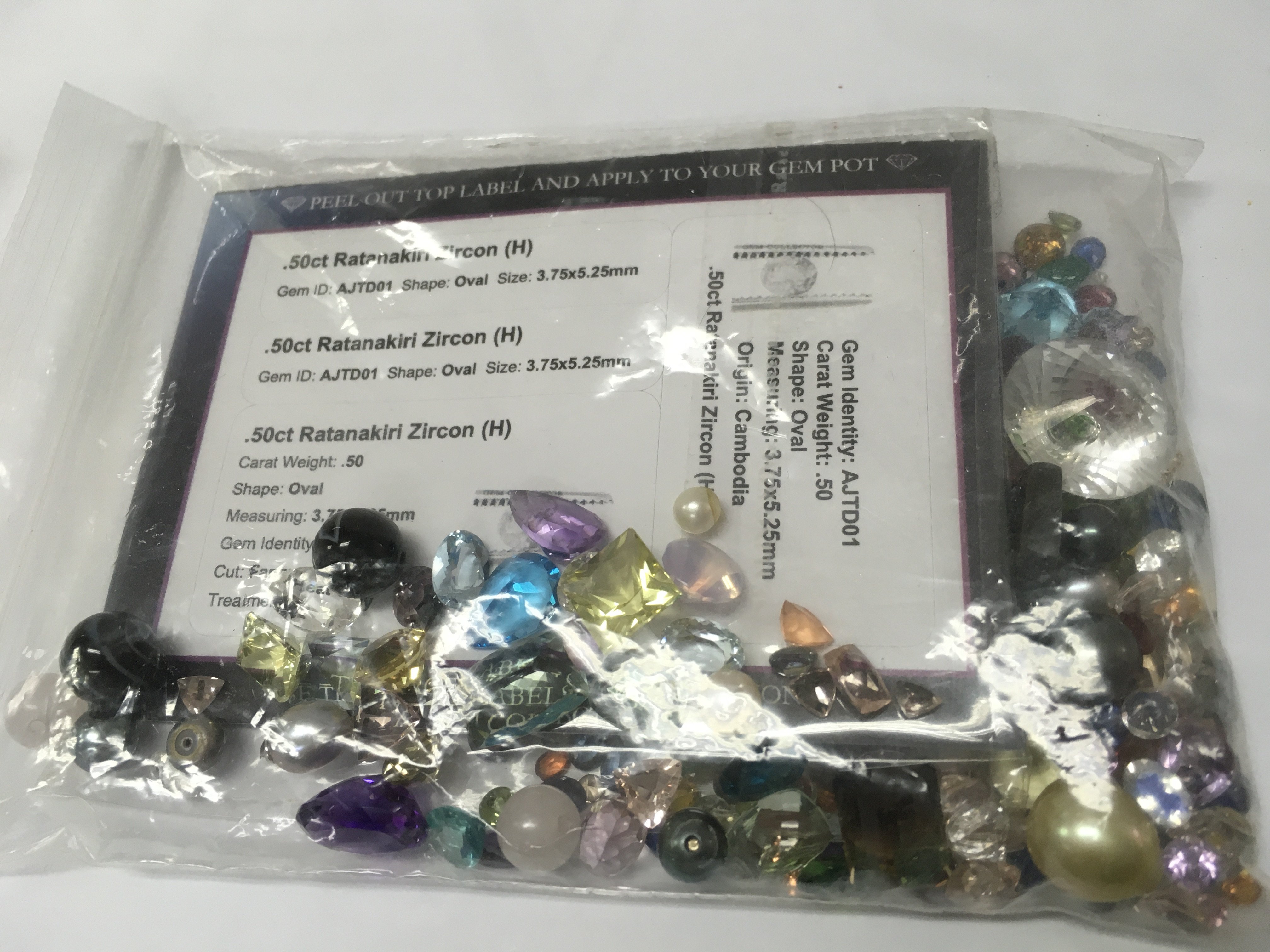 Mixed collection of stones . Postage category a