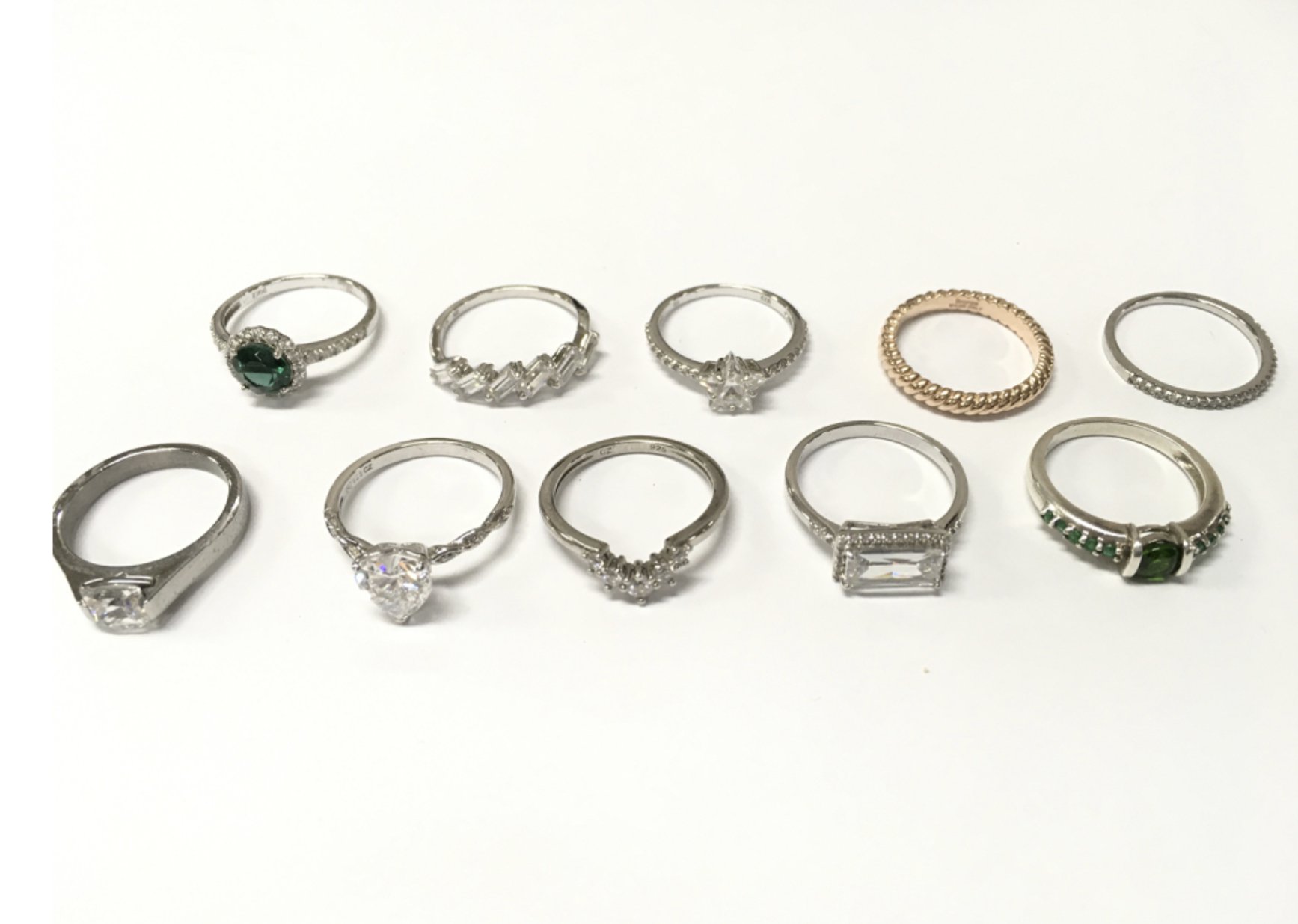 A collection of silver rings , also including bronze and stainless steel. Mostly size P. Postage category A