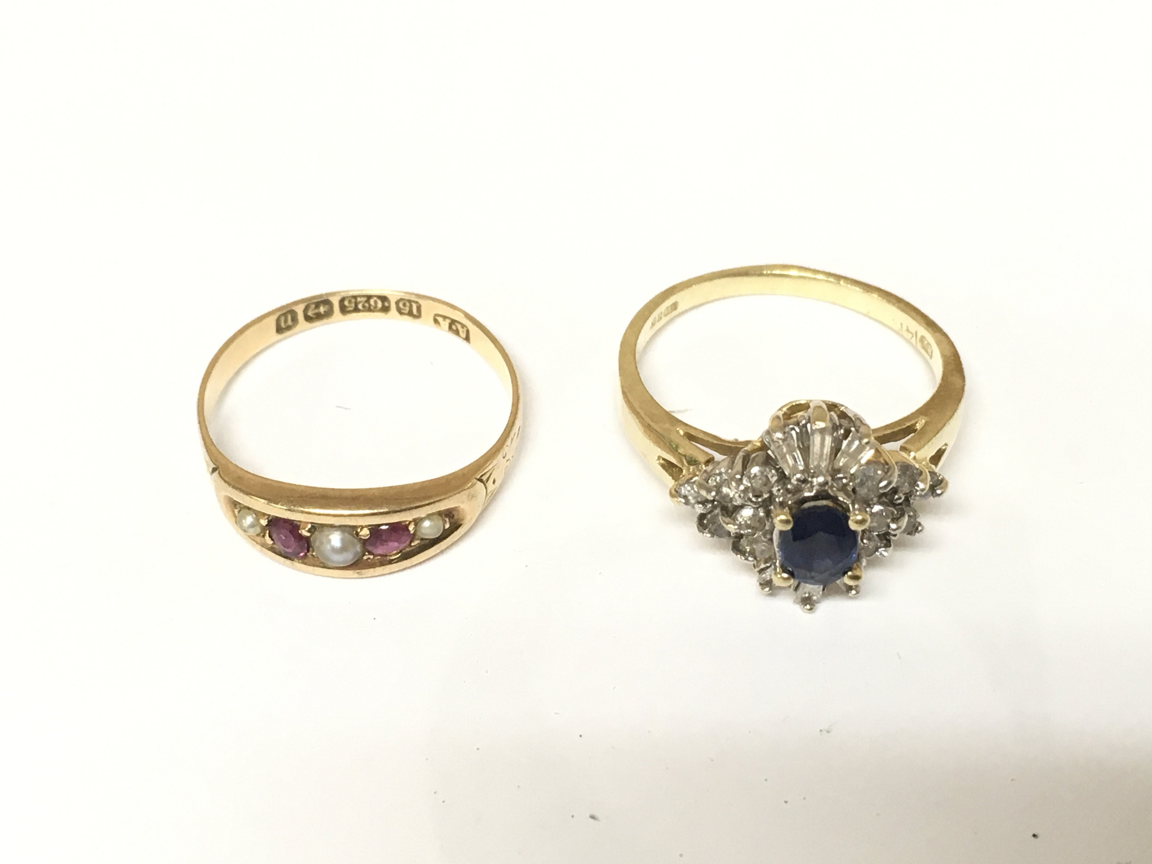 Two 14ct gold rings set with diamonds and other gems. Approximately 5.3g and size N