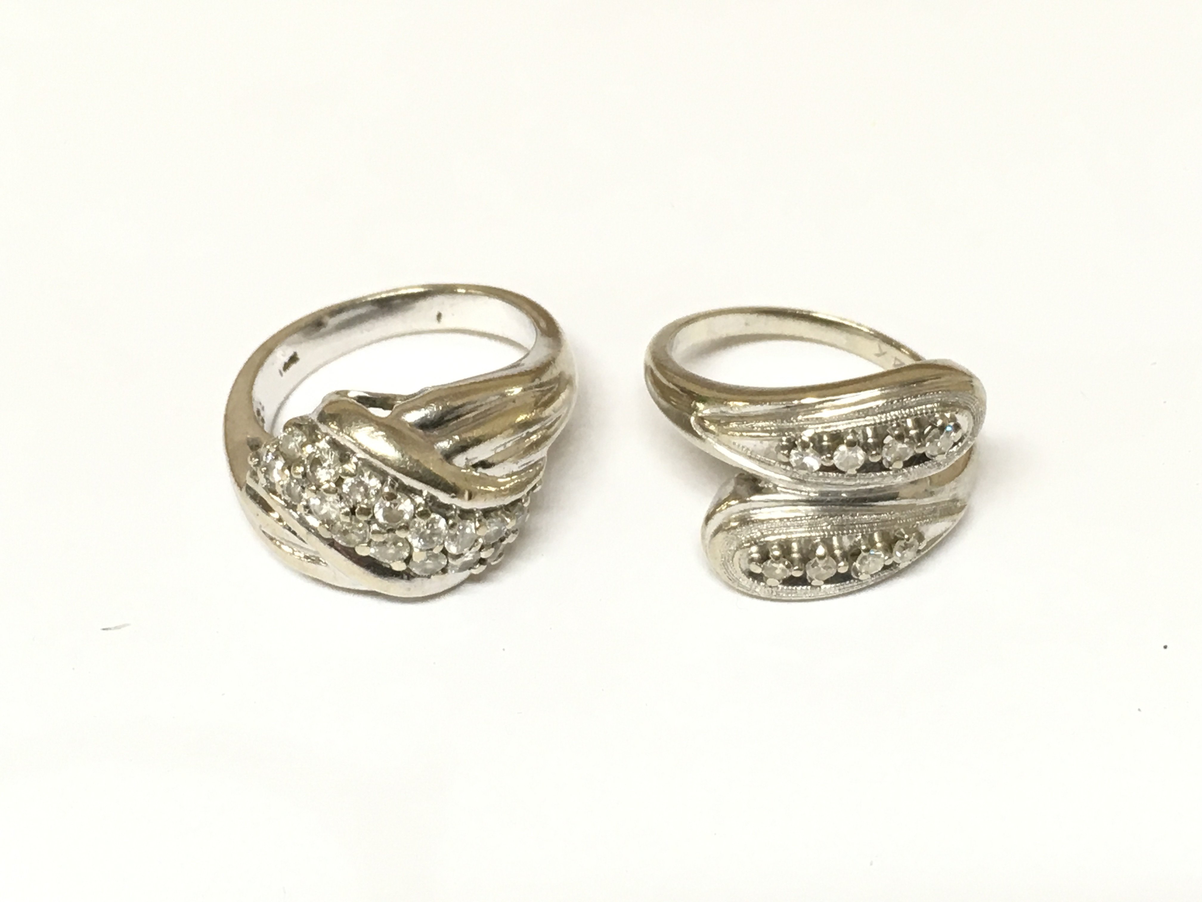 Two 14ct white gold diamond cluster rings. Approximately 11.8g and sizes K and L