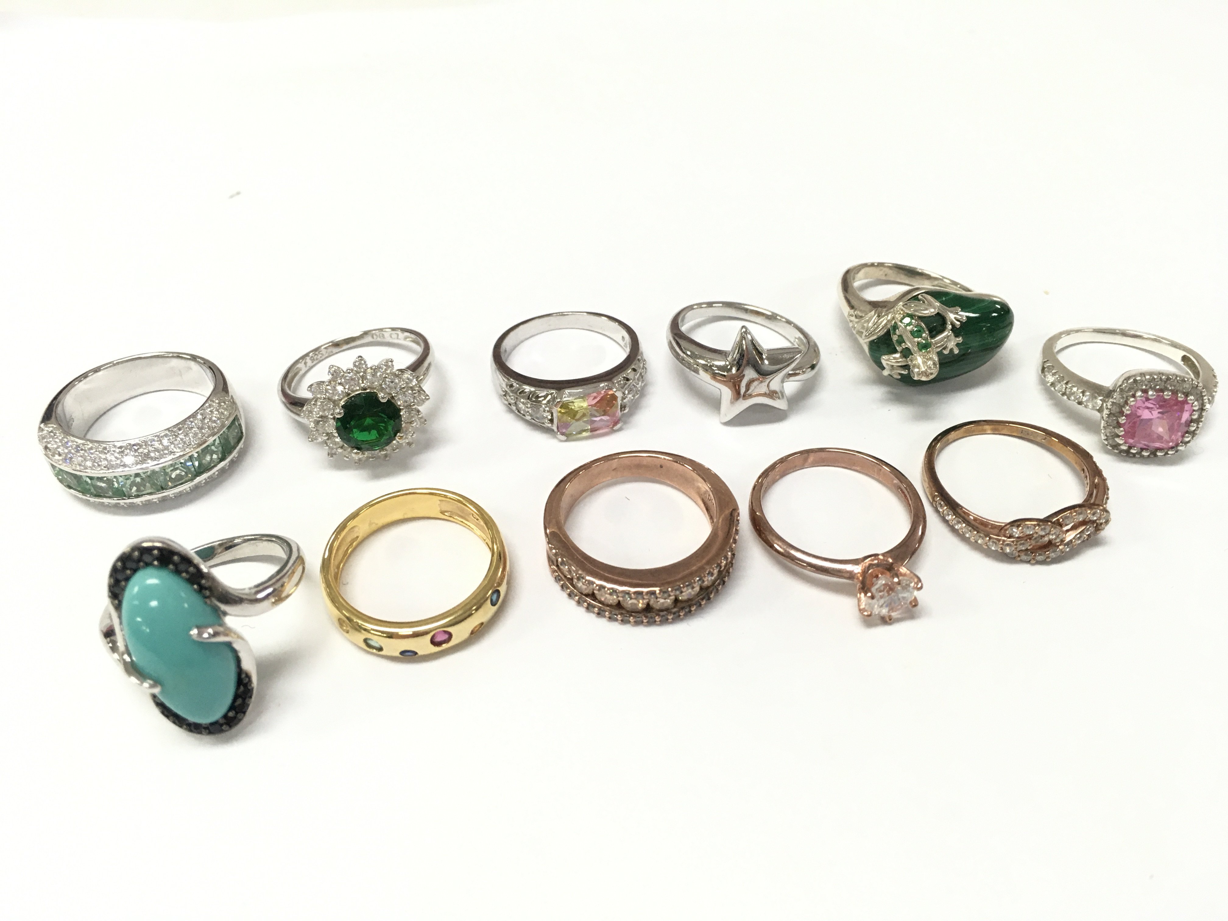 A Collection of silver rings sizes O and P. 55g total weight approximately. Postage category A