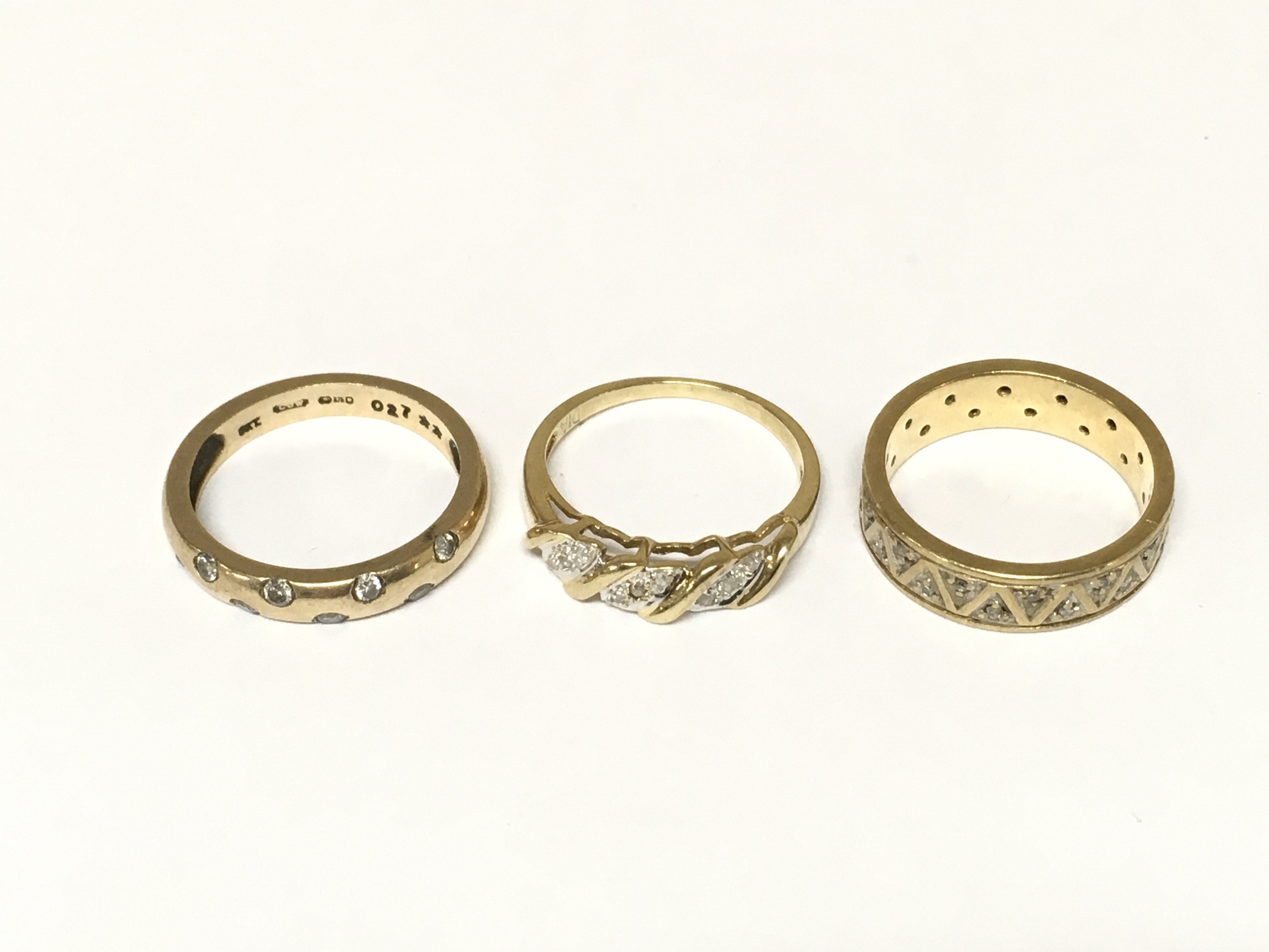 Three 9ct gold diamond rings. Approximately 9.5g and sizes L M and N