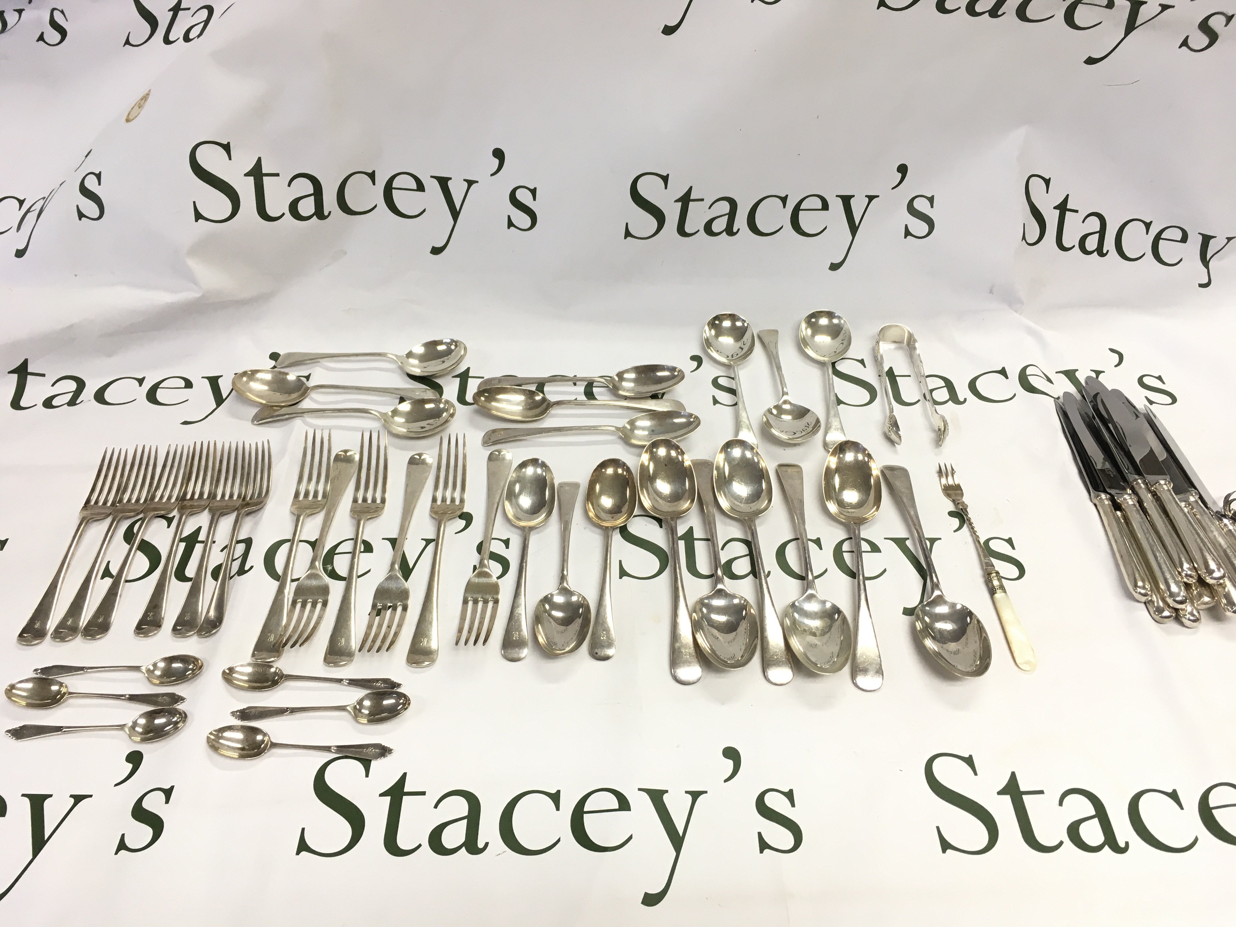 A collection of mixed cutlery including majority silver hallmarked. Silver items Approx 2kg. Postage B