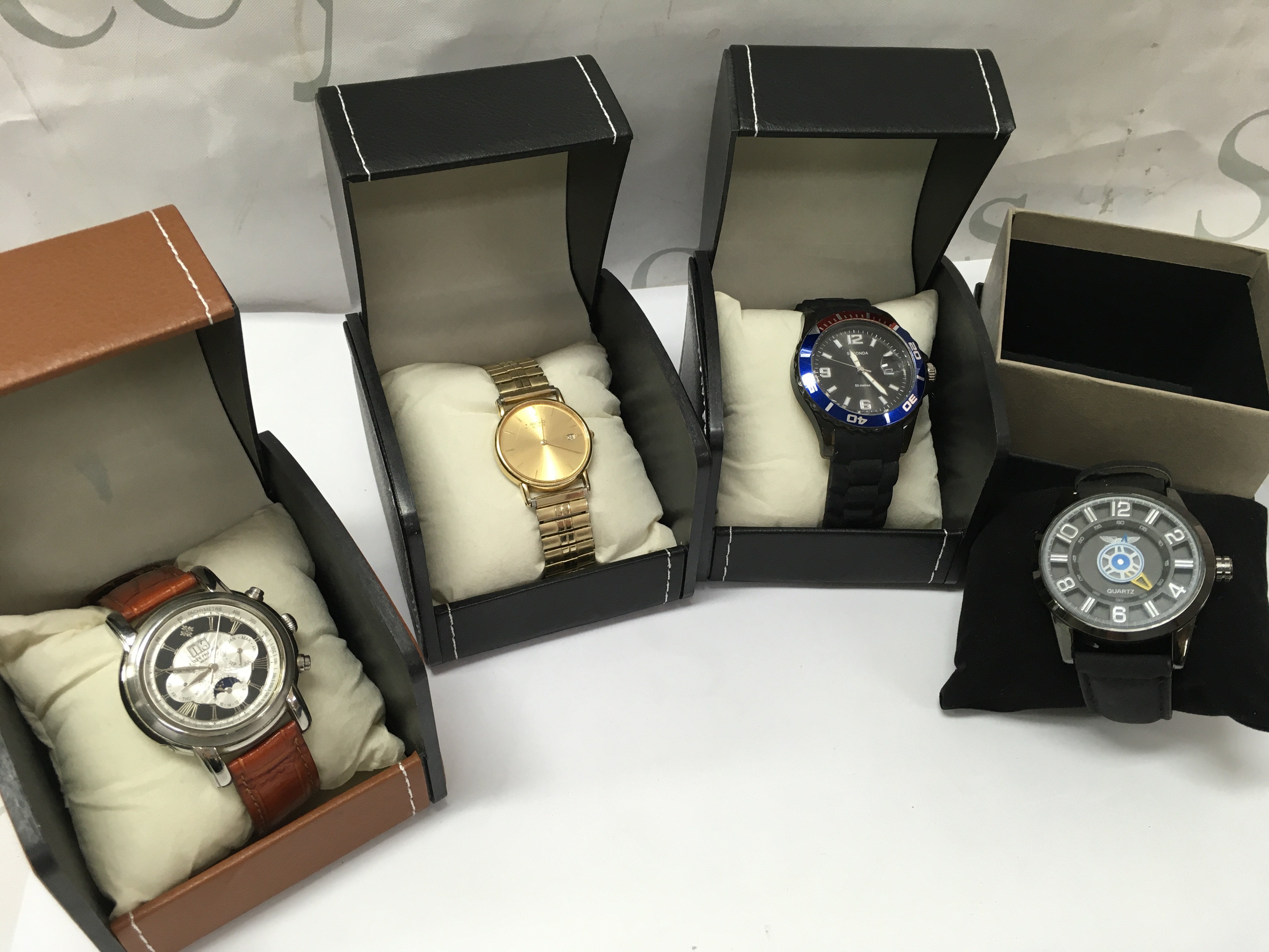 Four boxed Gents watches including Seiko, Sekonda etc. postage category C
