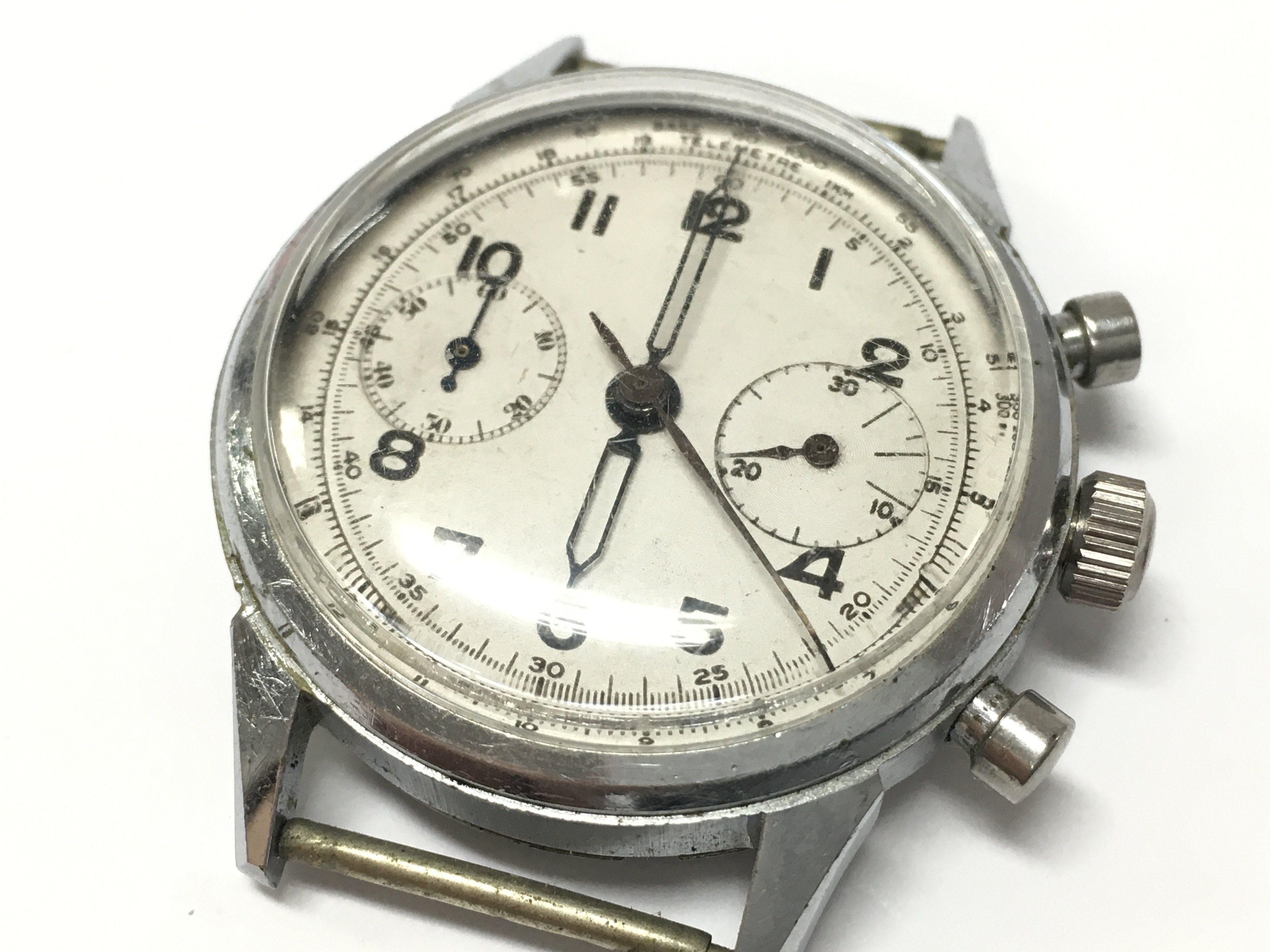 A vintage Fludo Swiss stainless steel chronograph Gents watch , no strap. Postage category A