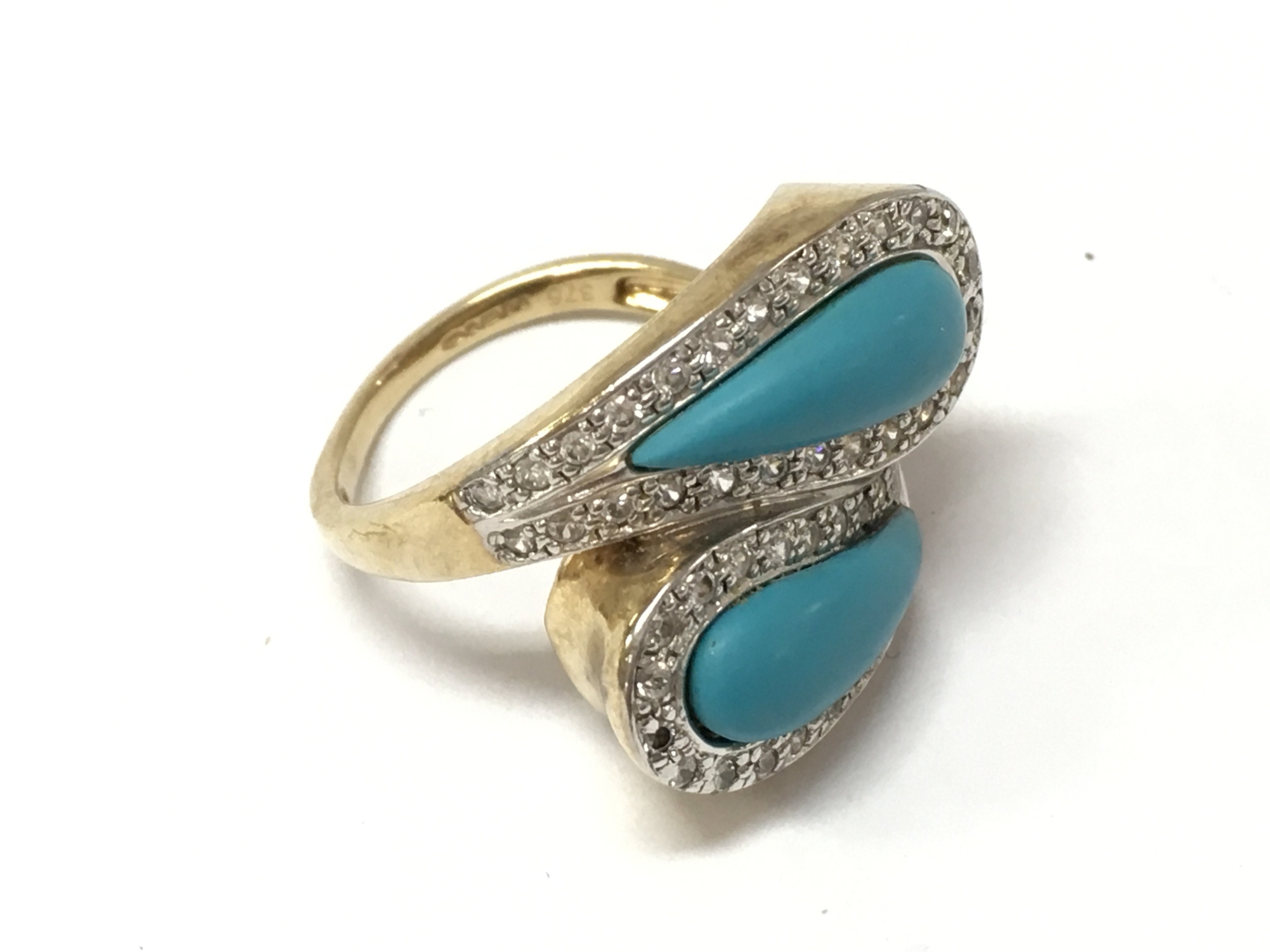 A 9ct gold Turquoise ring , size P. Postage category A