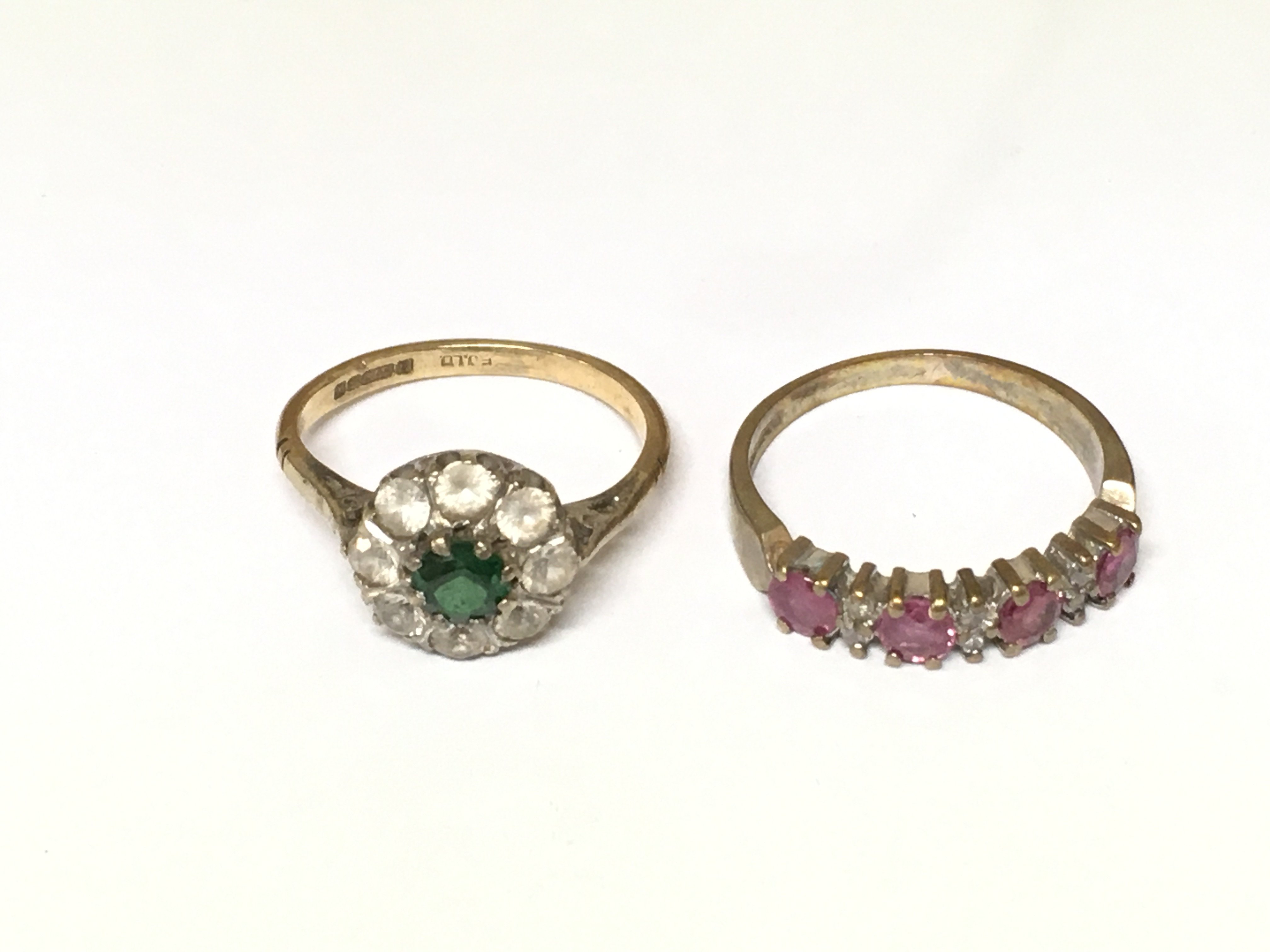 Two 9ct gold rings set with various gems. Size K and O and 5.07g