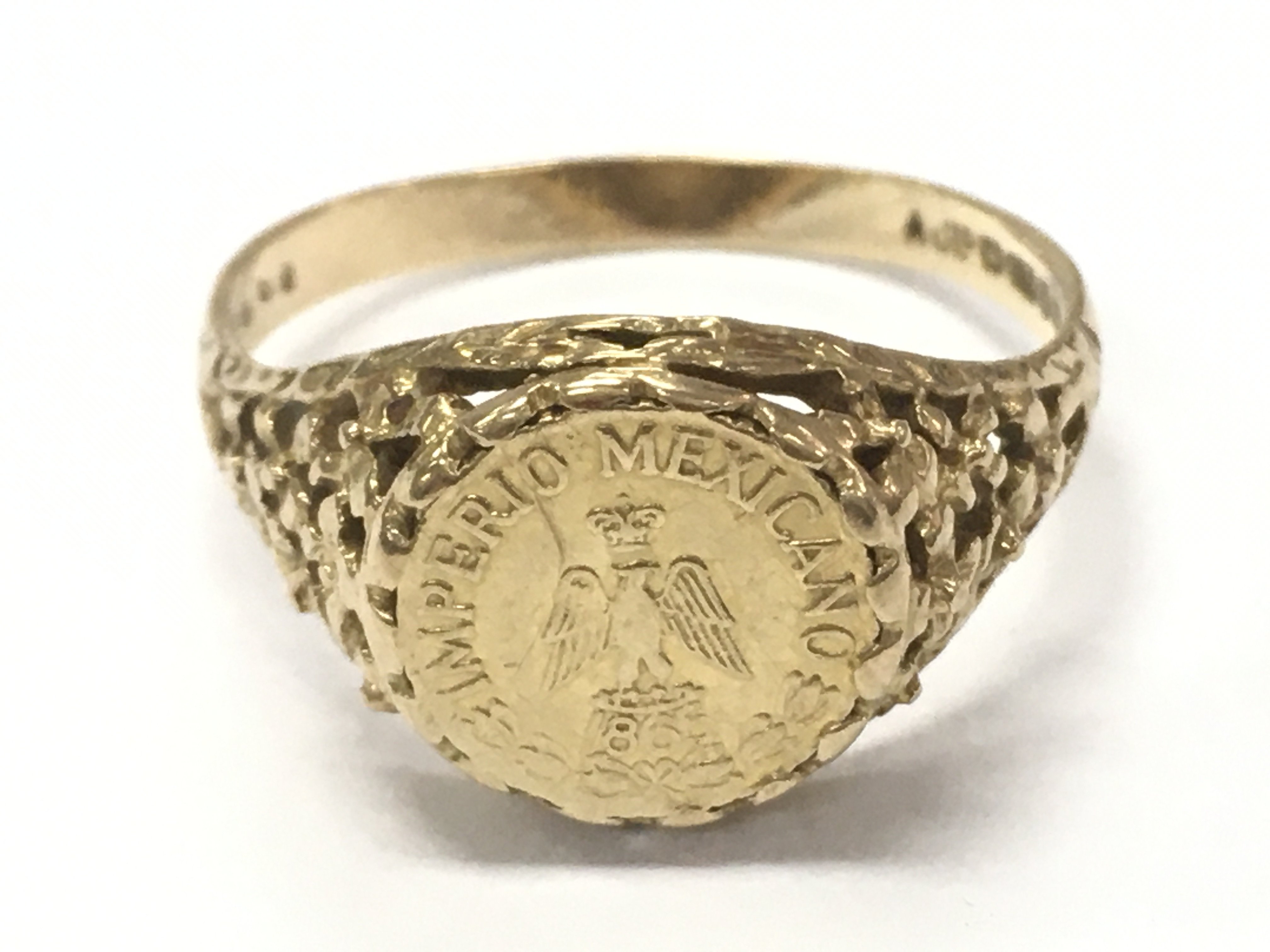 A Imperio Mexicano 1865 coin mounted in a 9 carat gold ring . Size R. Total weight 2.9g Postage cat a