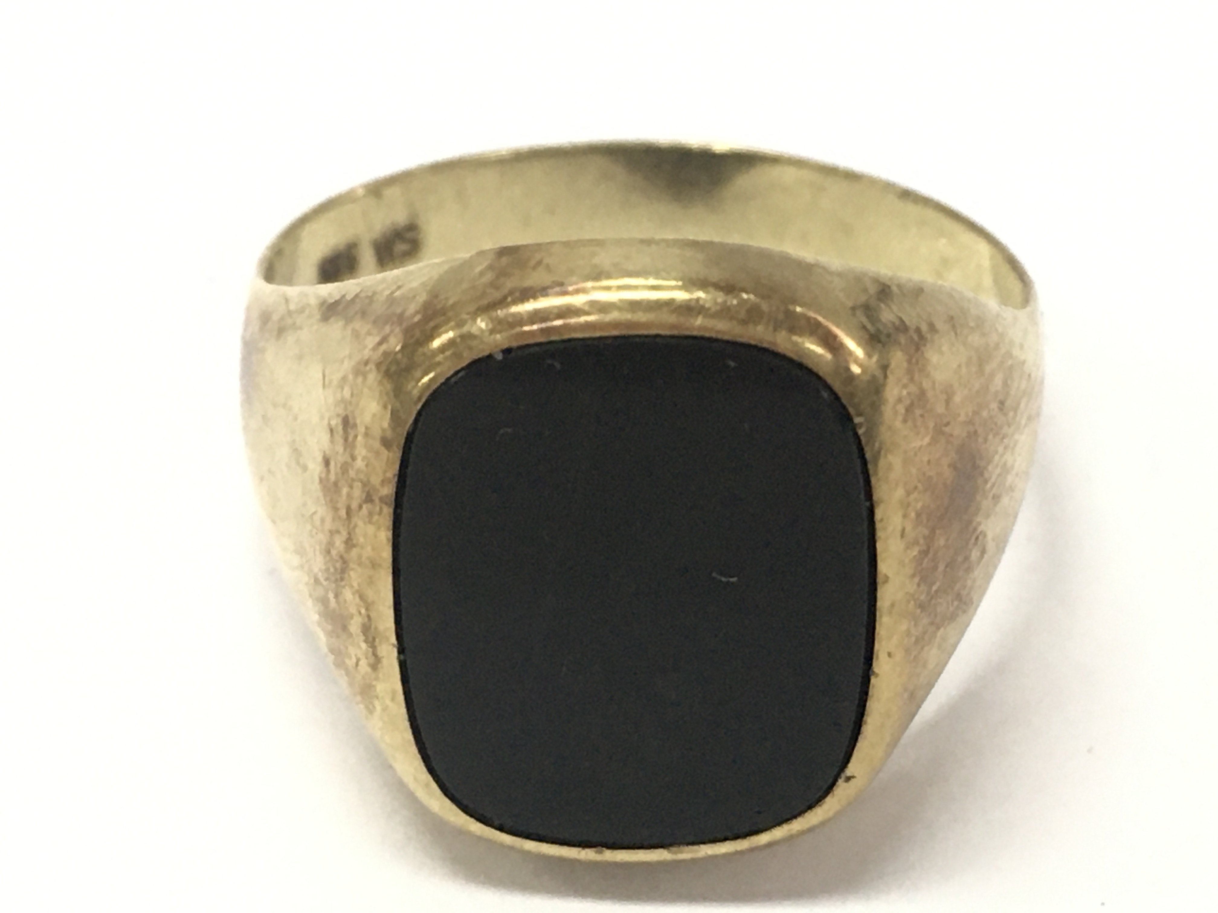 A 14ct gold signet ring , 4.8g total weight. Size W. Postage category A