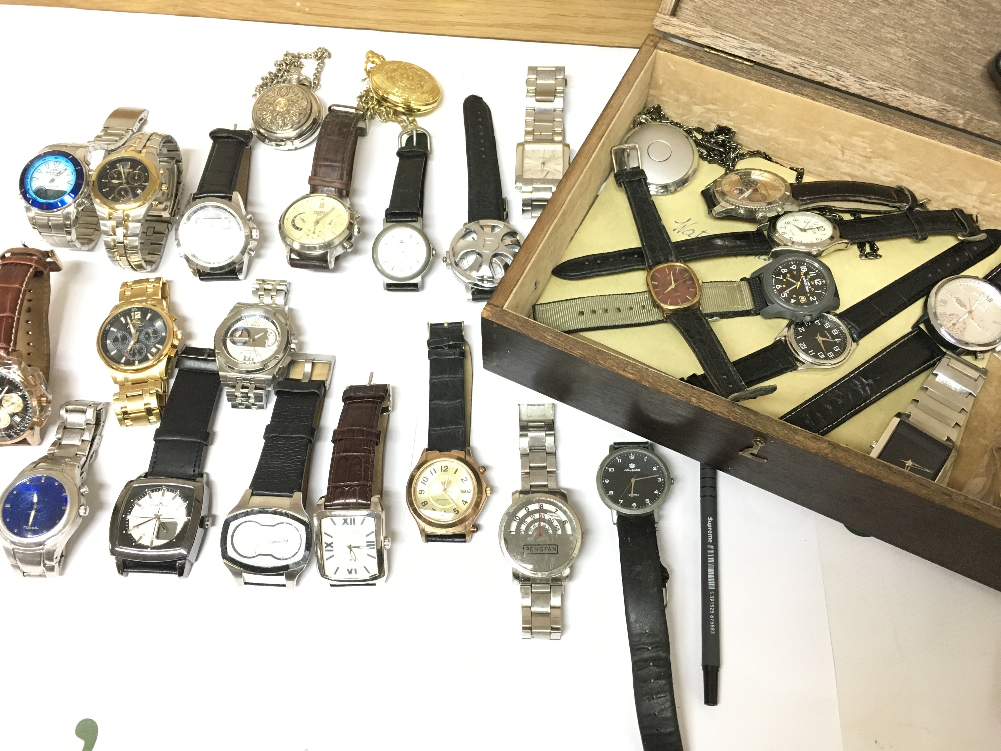 A large collection of assorted dress watches including Citizen Casio etc