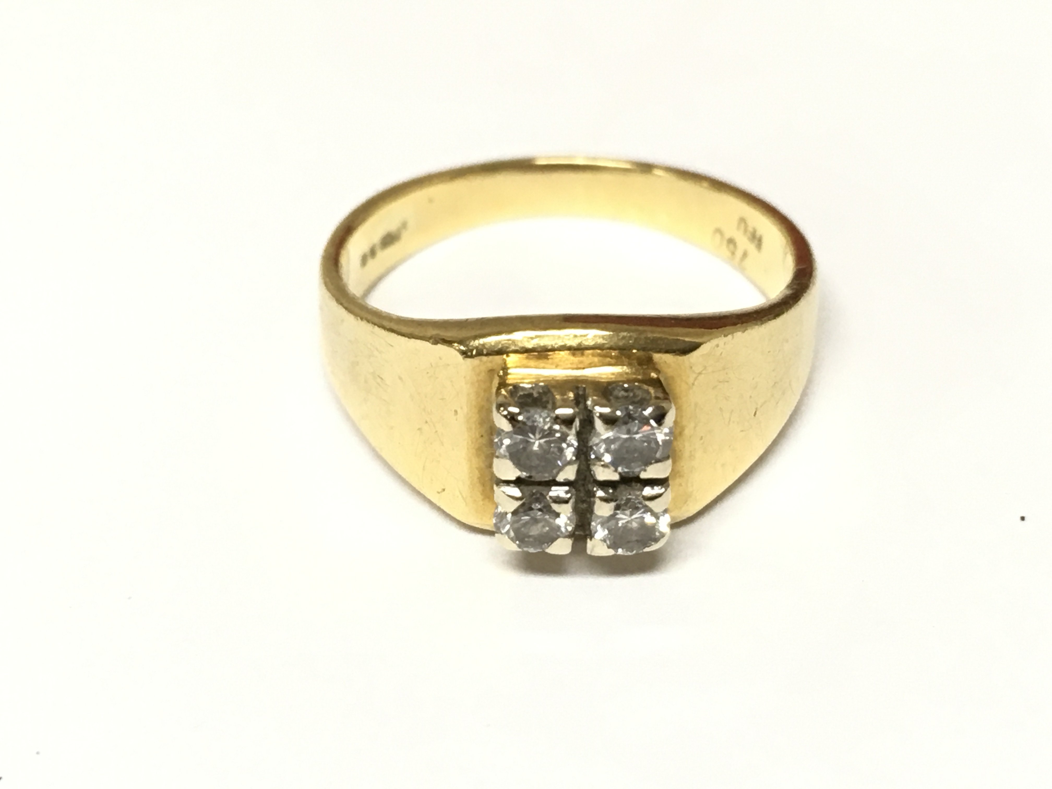 An 18ct gold 4 stone diamond ring. Size I 1/2 and 4.02g