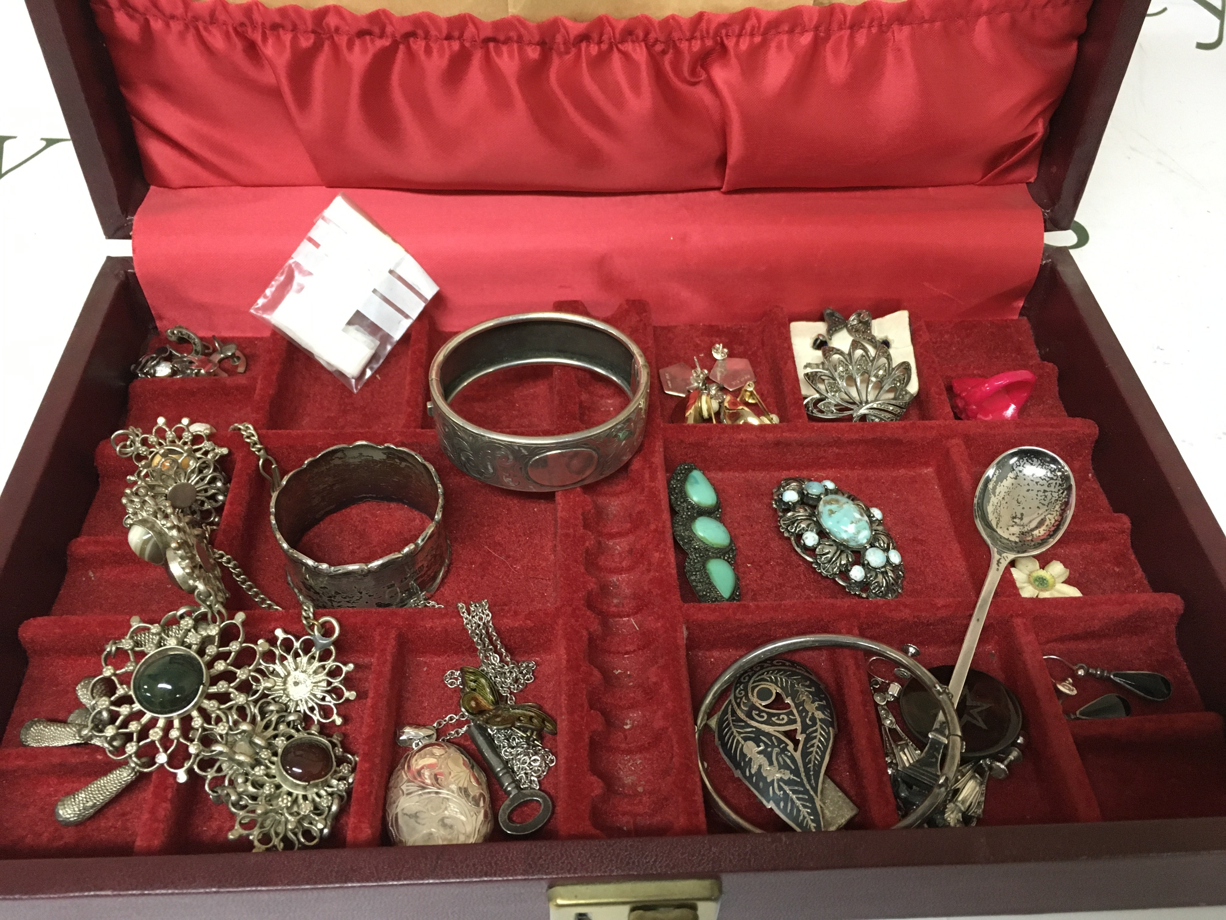A collection of costume jewellery including silver examples.