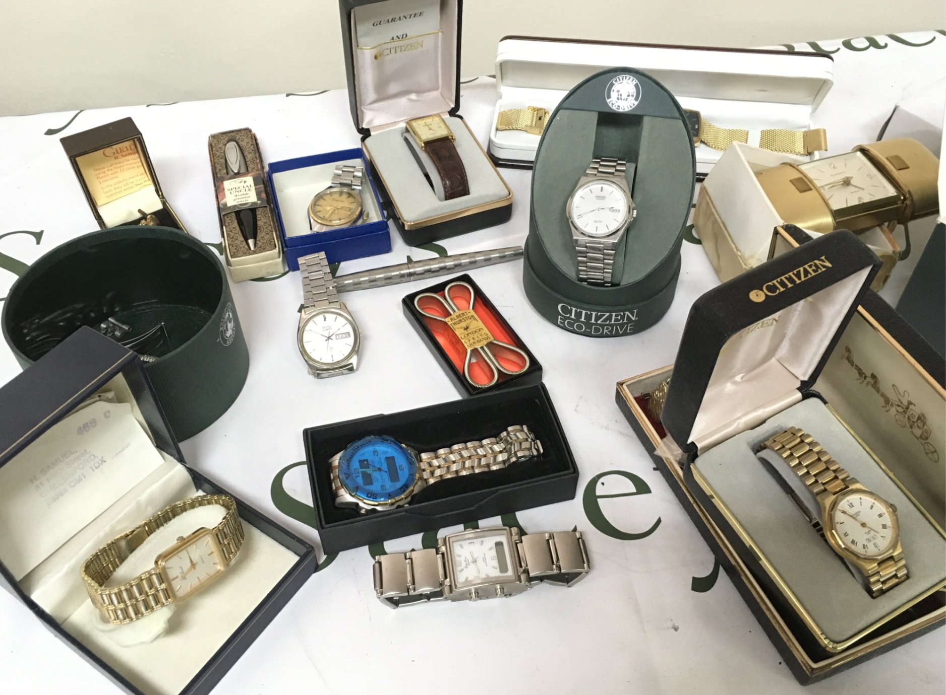 A collection of gents watches including Seiko, Citizen and other watches including cuff links