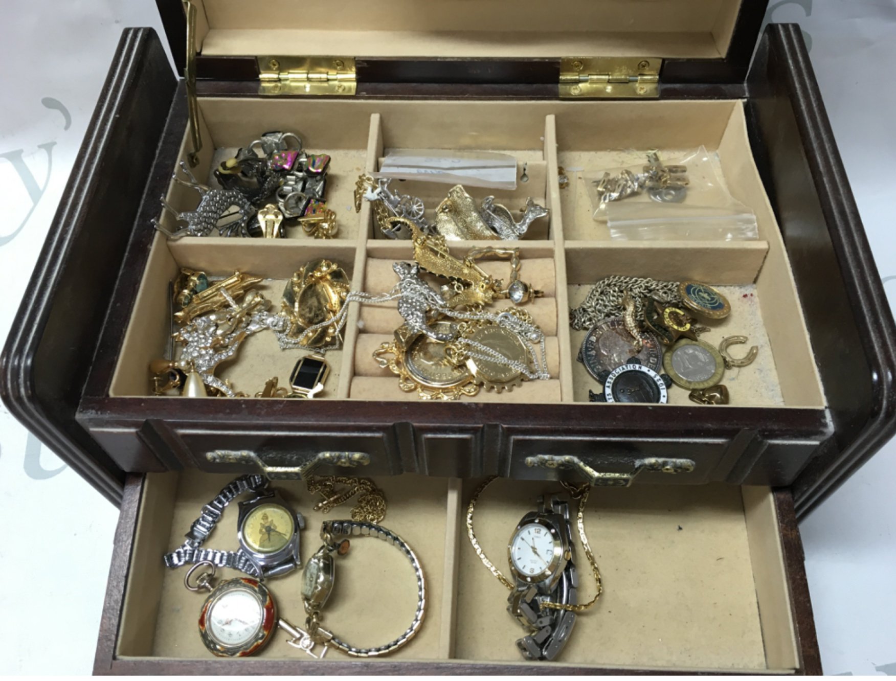 A collection of costume jewellery including a silver Argent Dore fob watch, broochesm necklaces etc. postage cat B