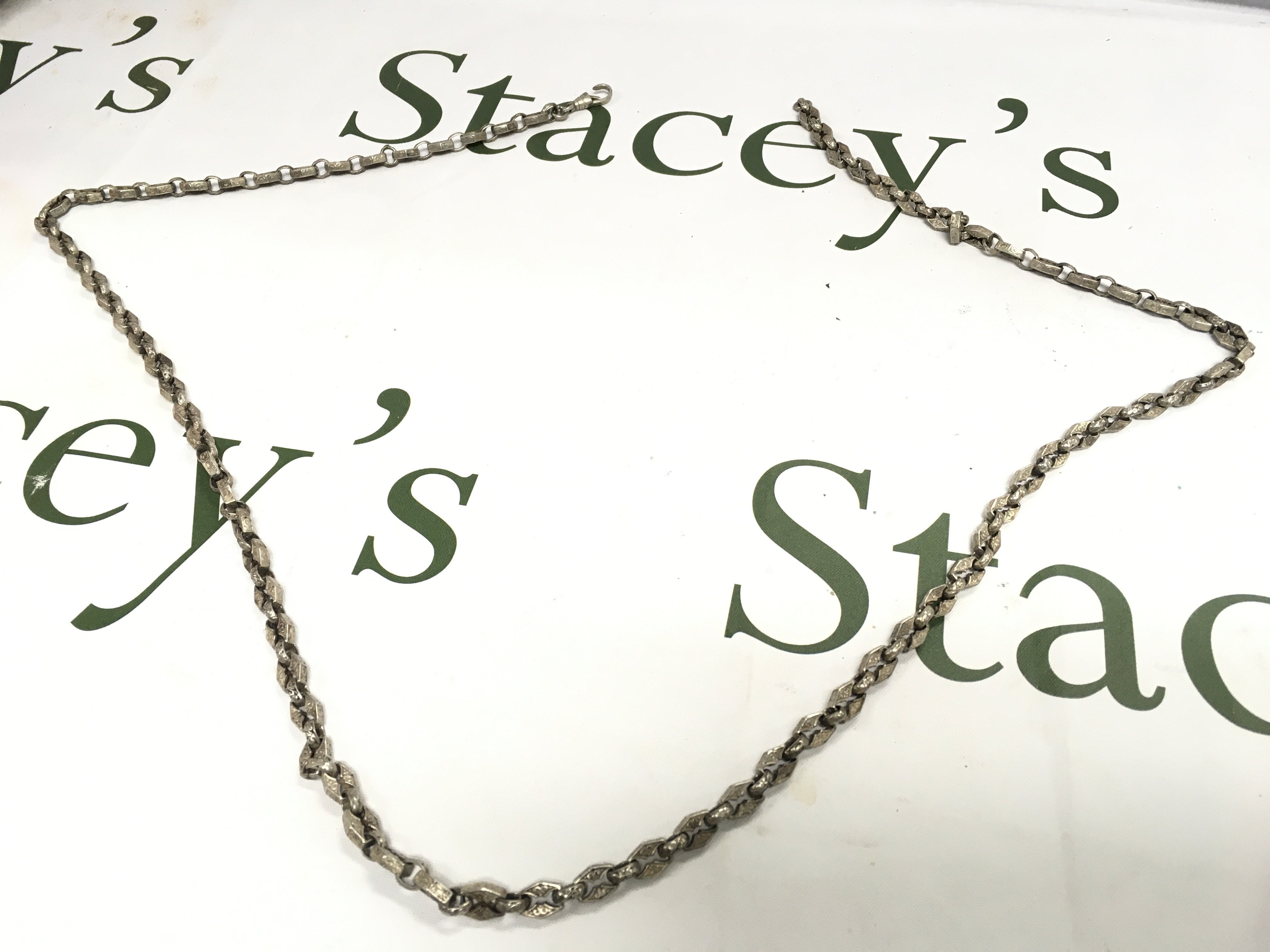 Fancy sterling silver engraved necklace . Postage category A