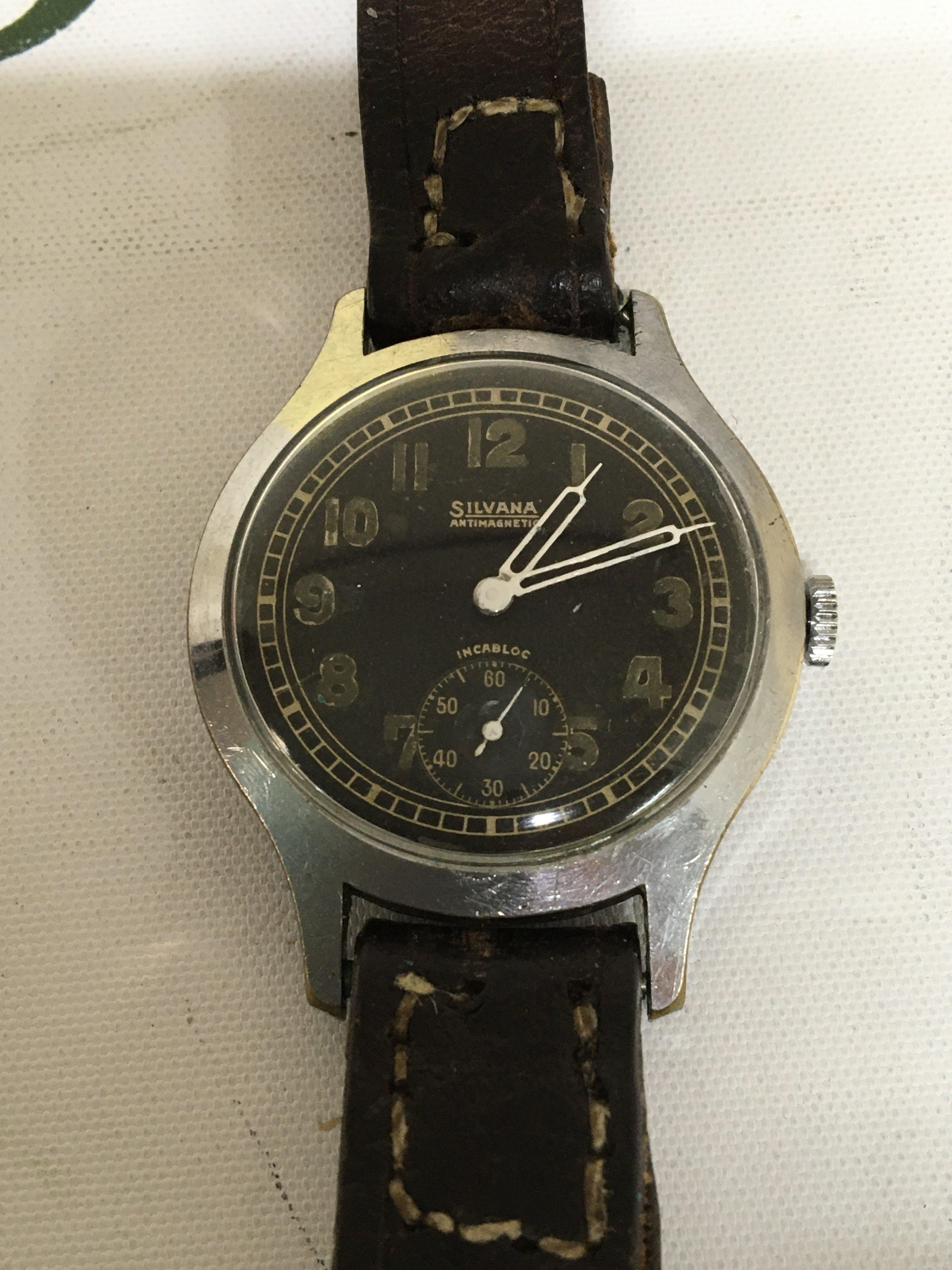 A Military watch Maker Silvana Animatic circa 1940 black dial with illuminating batons second subsidiary dial the reverse stamped Made in England London made. Watch seen working.