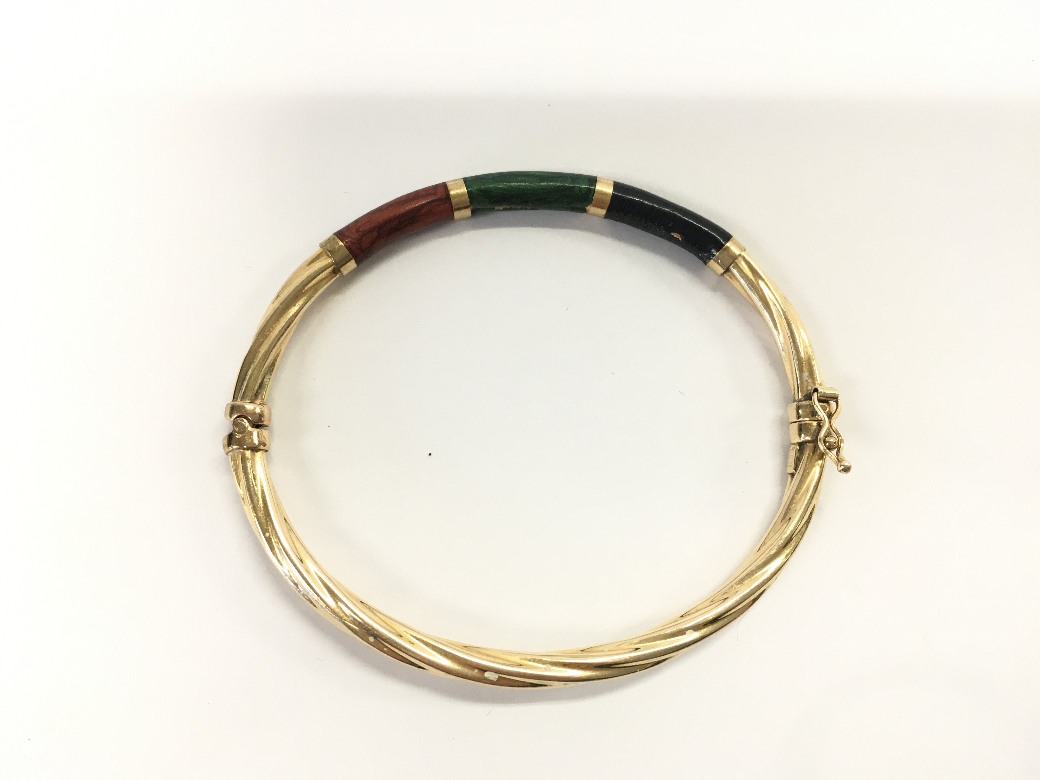 A 9ct gold bangle. 5.88g approximately Postage A