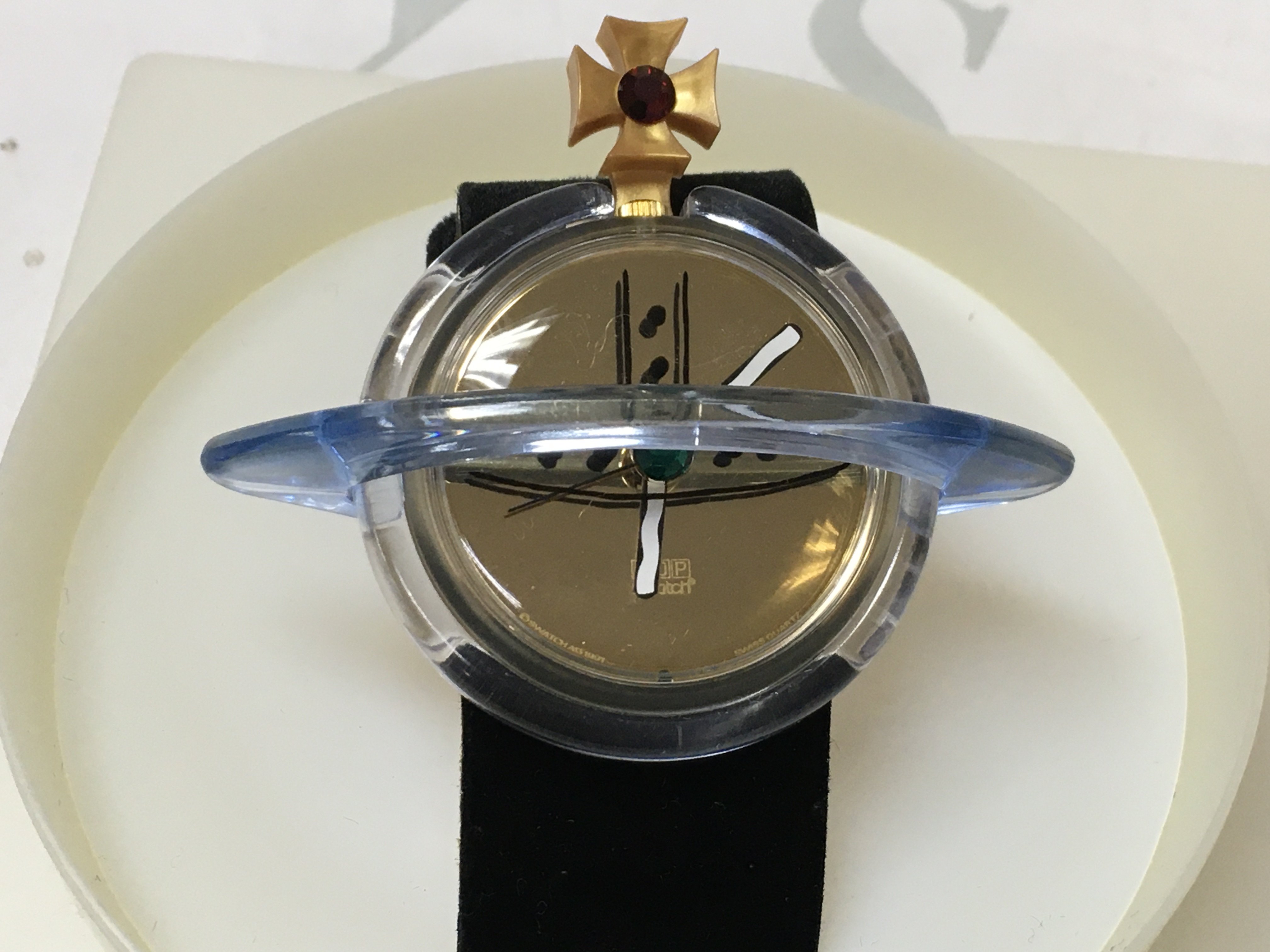 A Vivienne westwood "orb" pop swatch wrist watch.