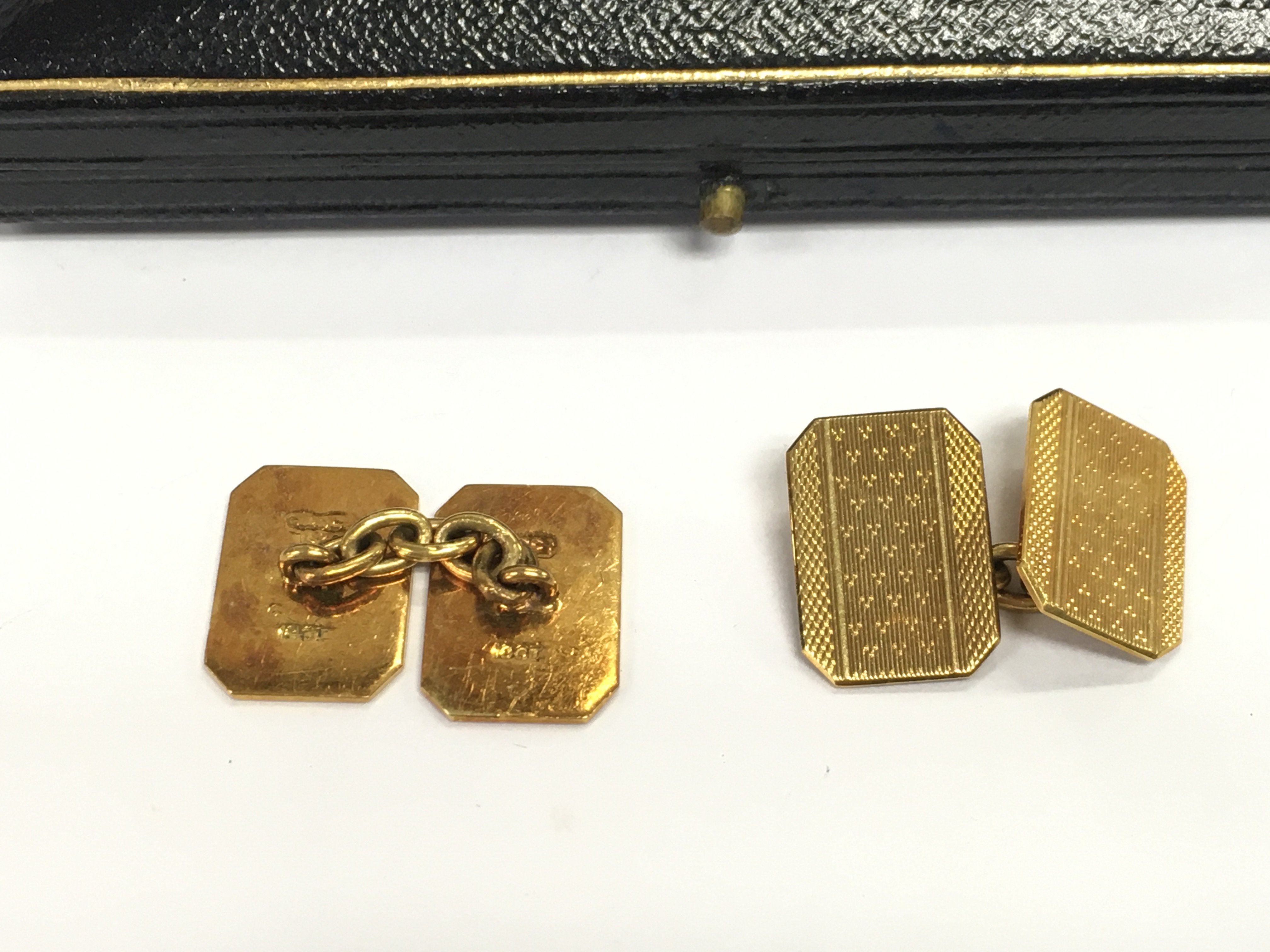 A cased paid of 18ct gold cufflinks. Approximately 9g