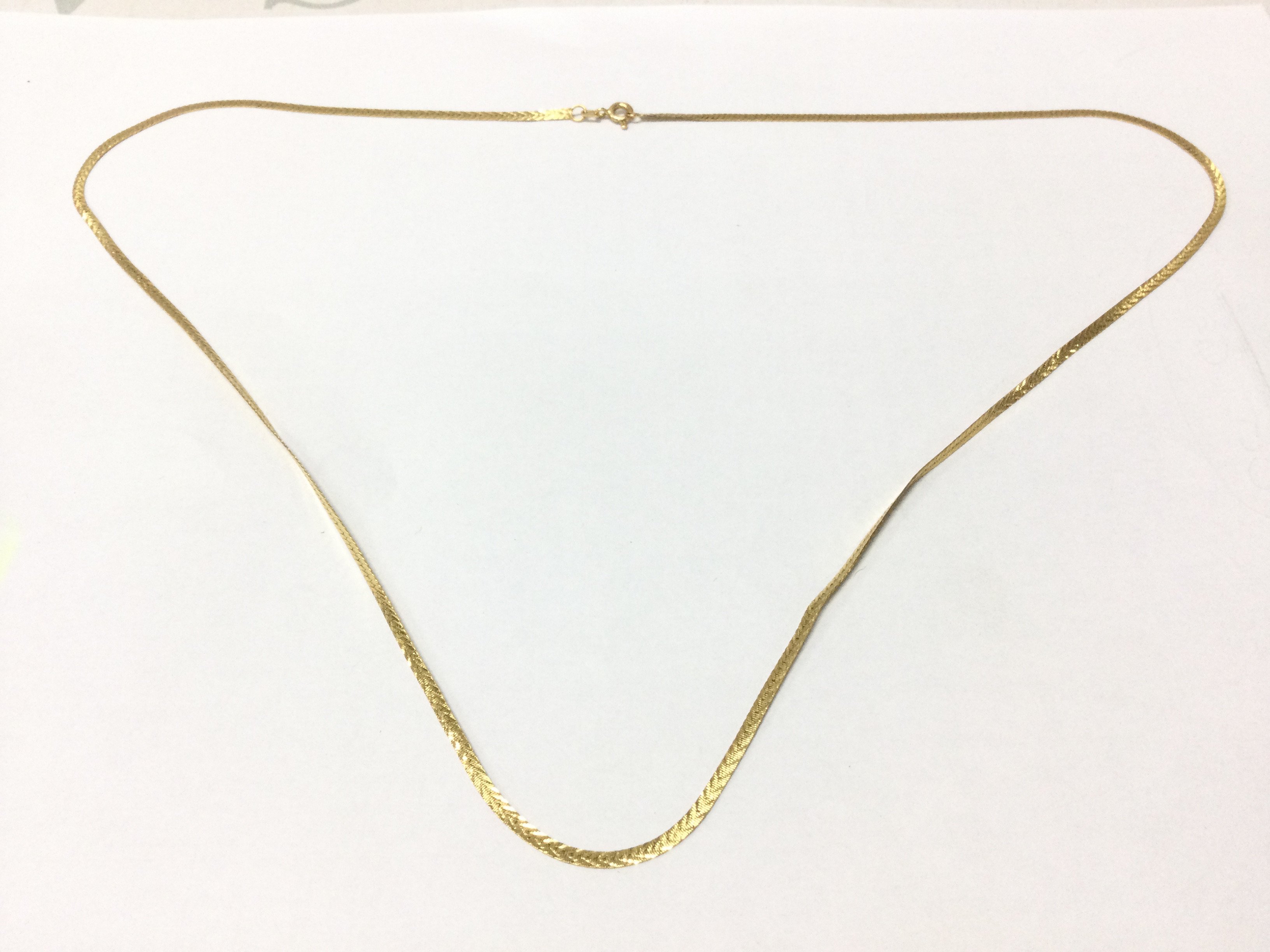 A 14ct gold necklace . 4.4g total weight, Postage category A
