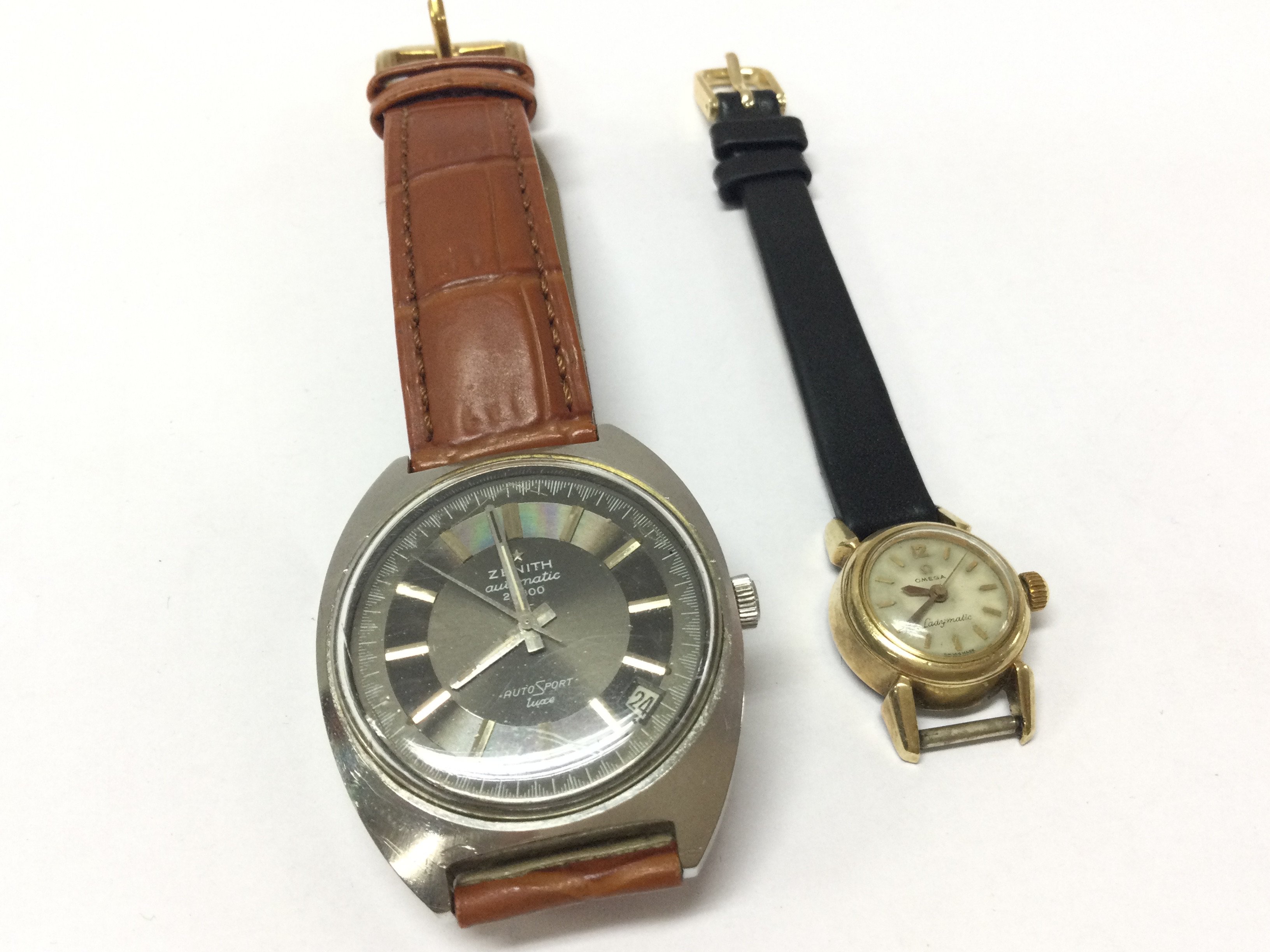 An Omega Ladymatic watch and a Zenith Automatic 28800 auto sport luxe. Both seen working. Postage category A