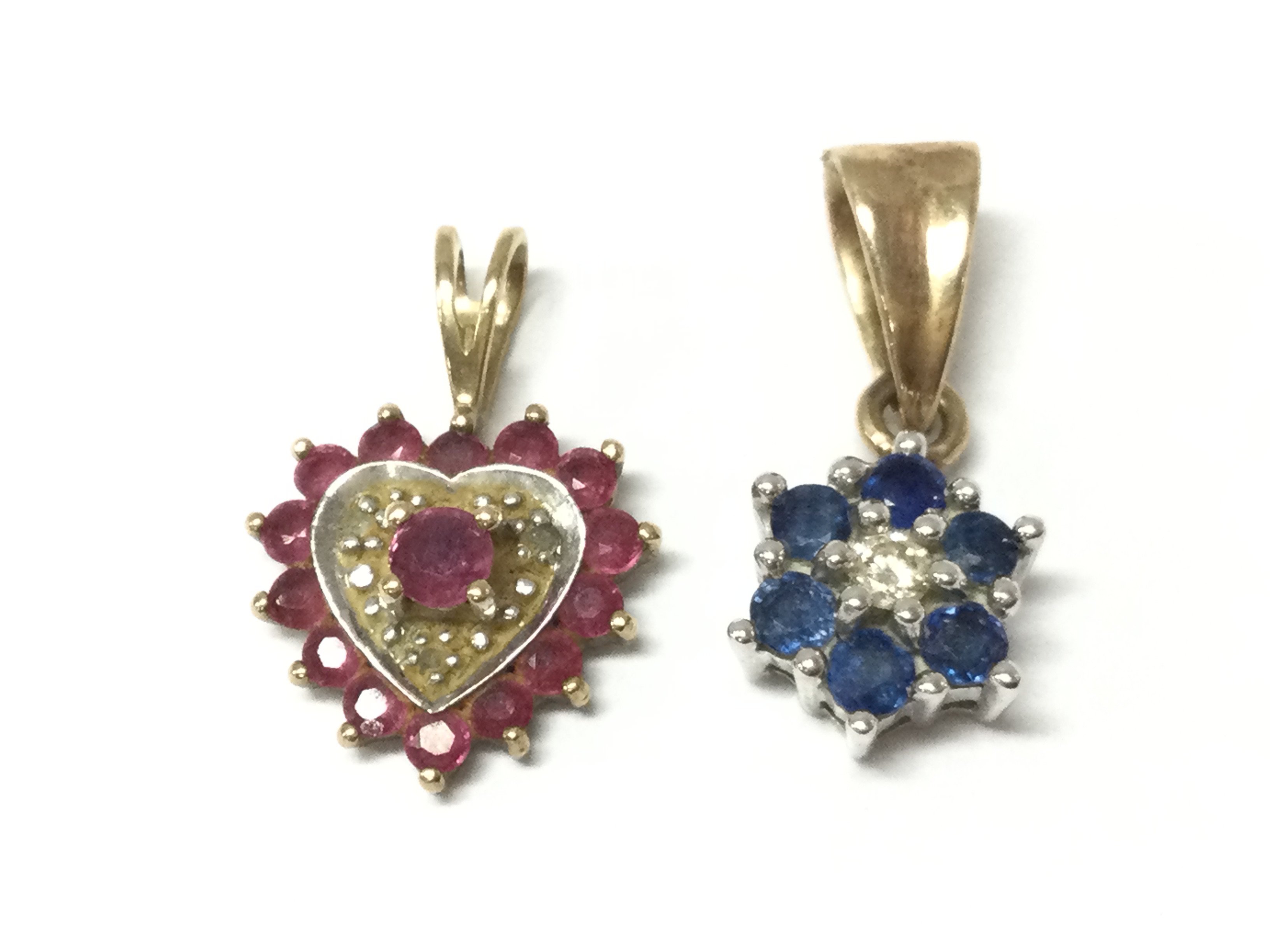 Two 9ct stone set pendants , 2g total weight. Postage category A
