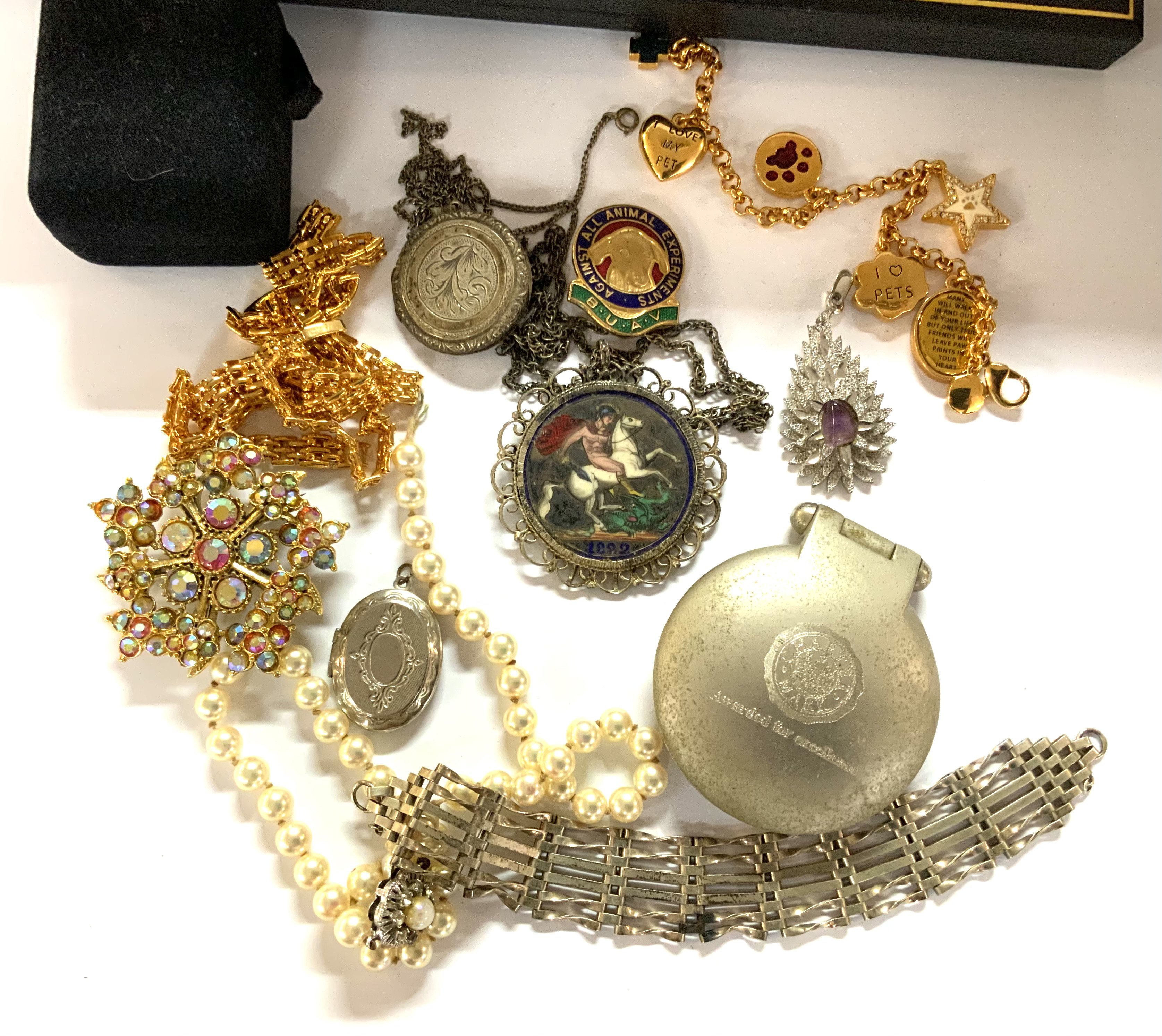 A small collection of items including an enamelled silver crown etc.