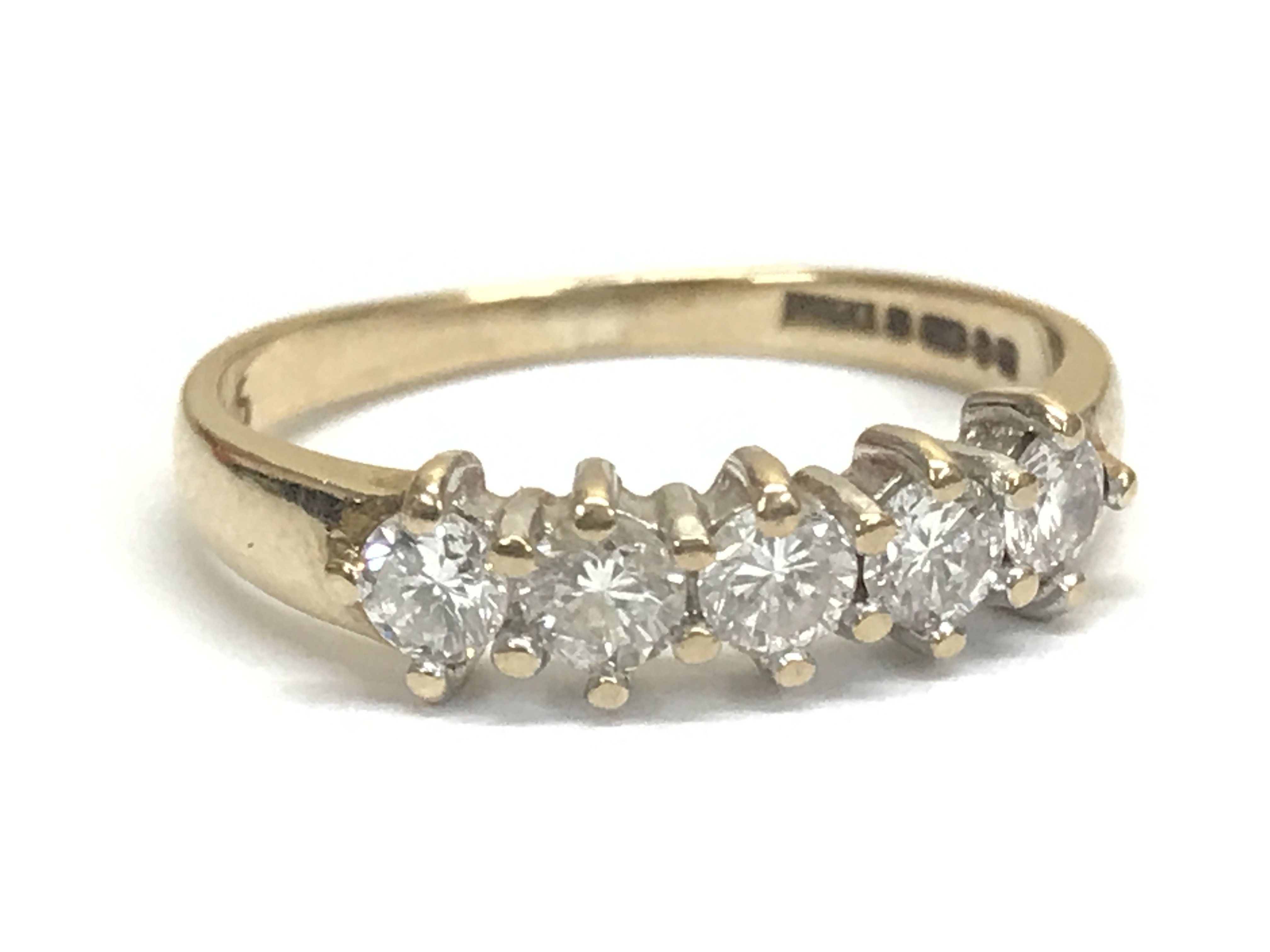 9ct .45ct diamond five stone ring, size H/I. 1.6g total weight. Postage category A