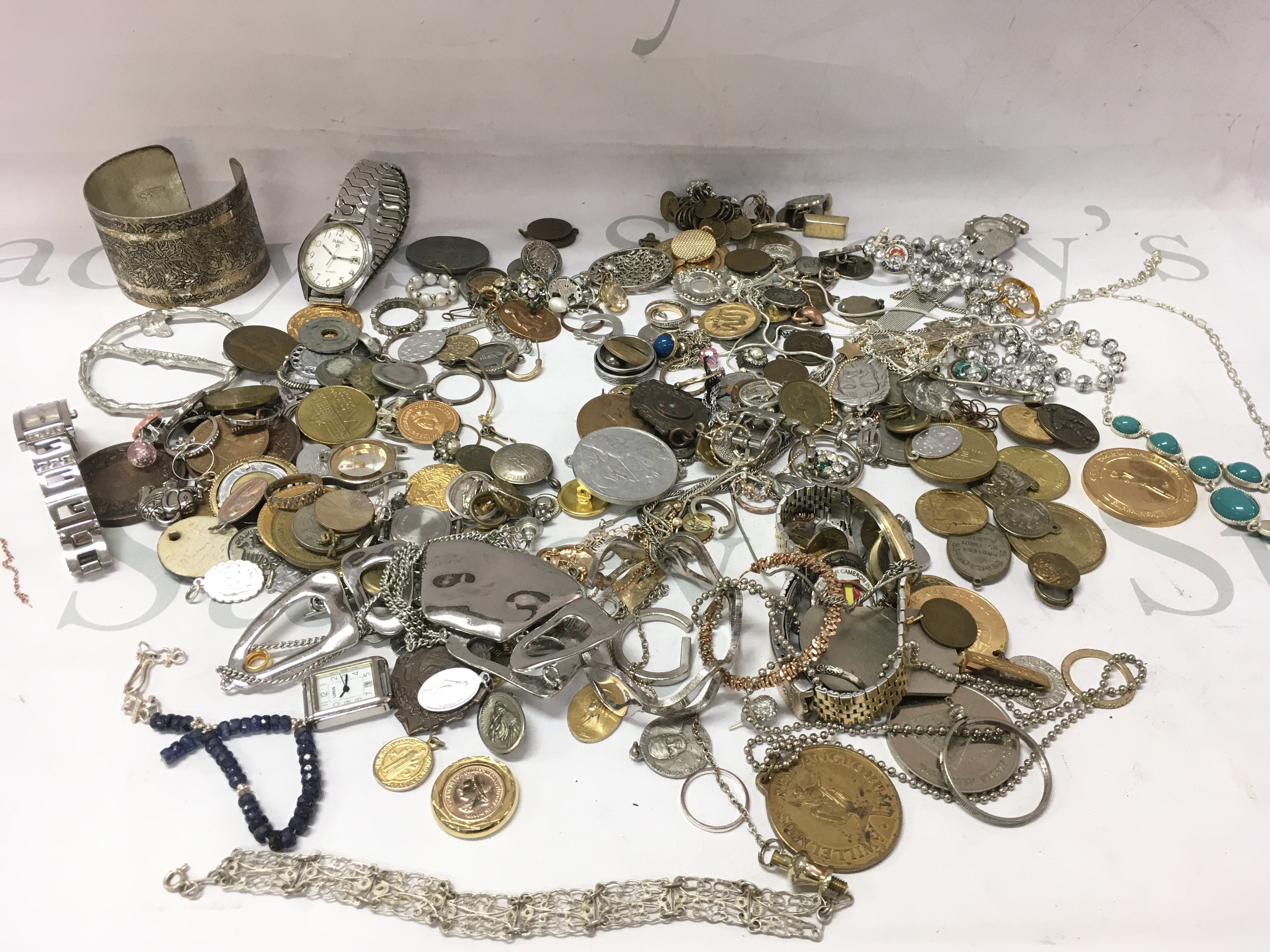 A collection of assorted costumes jewellery including some silver items.