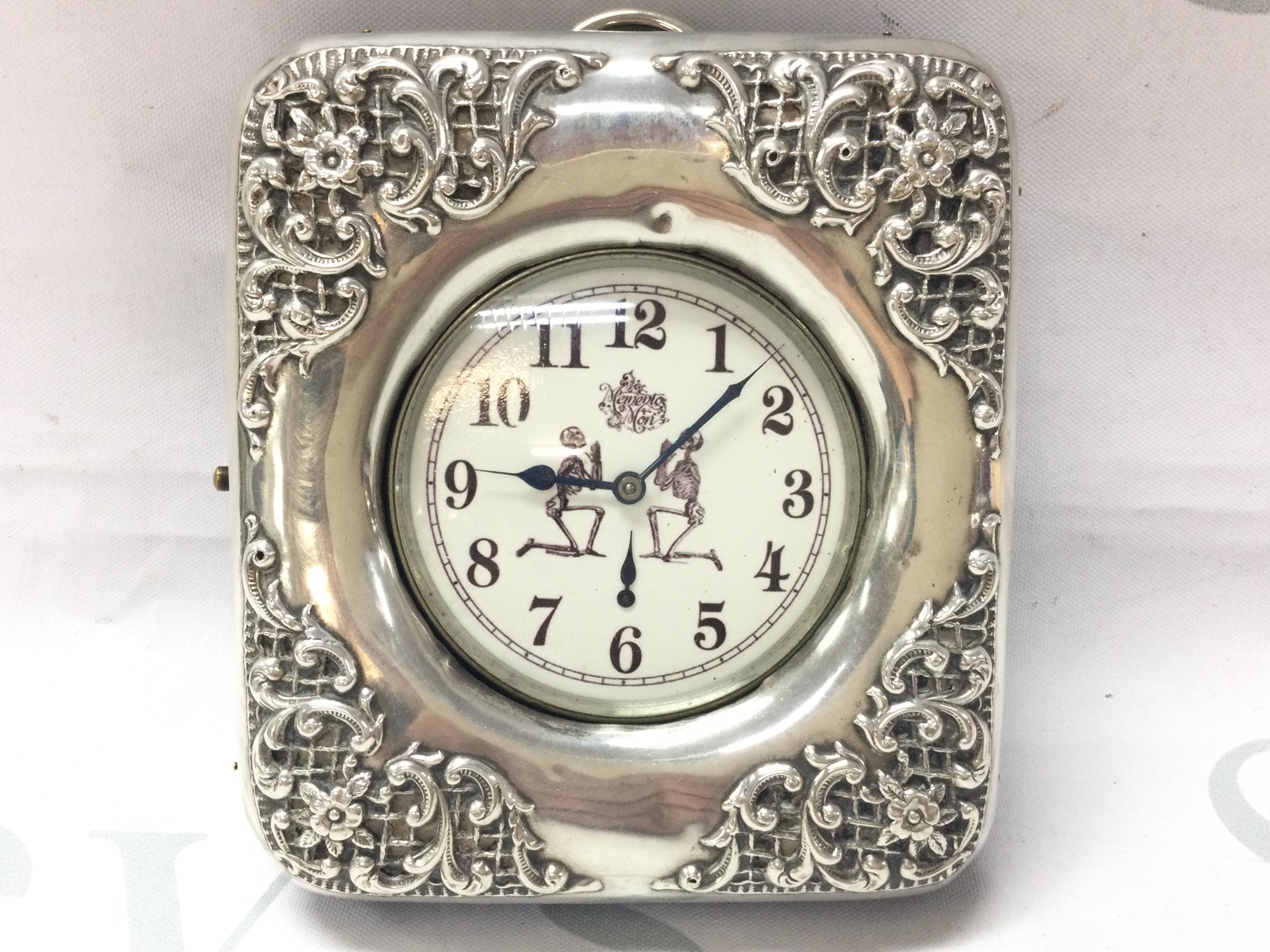 An Edwardian Goliath pocket watch with Memento Mori face and silver hallmarked case