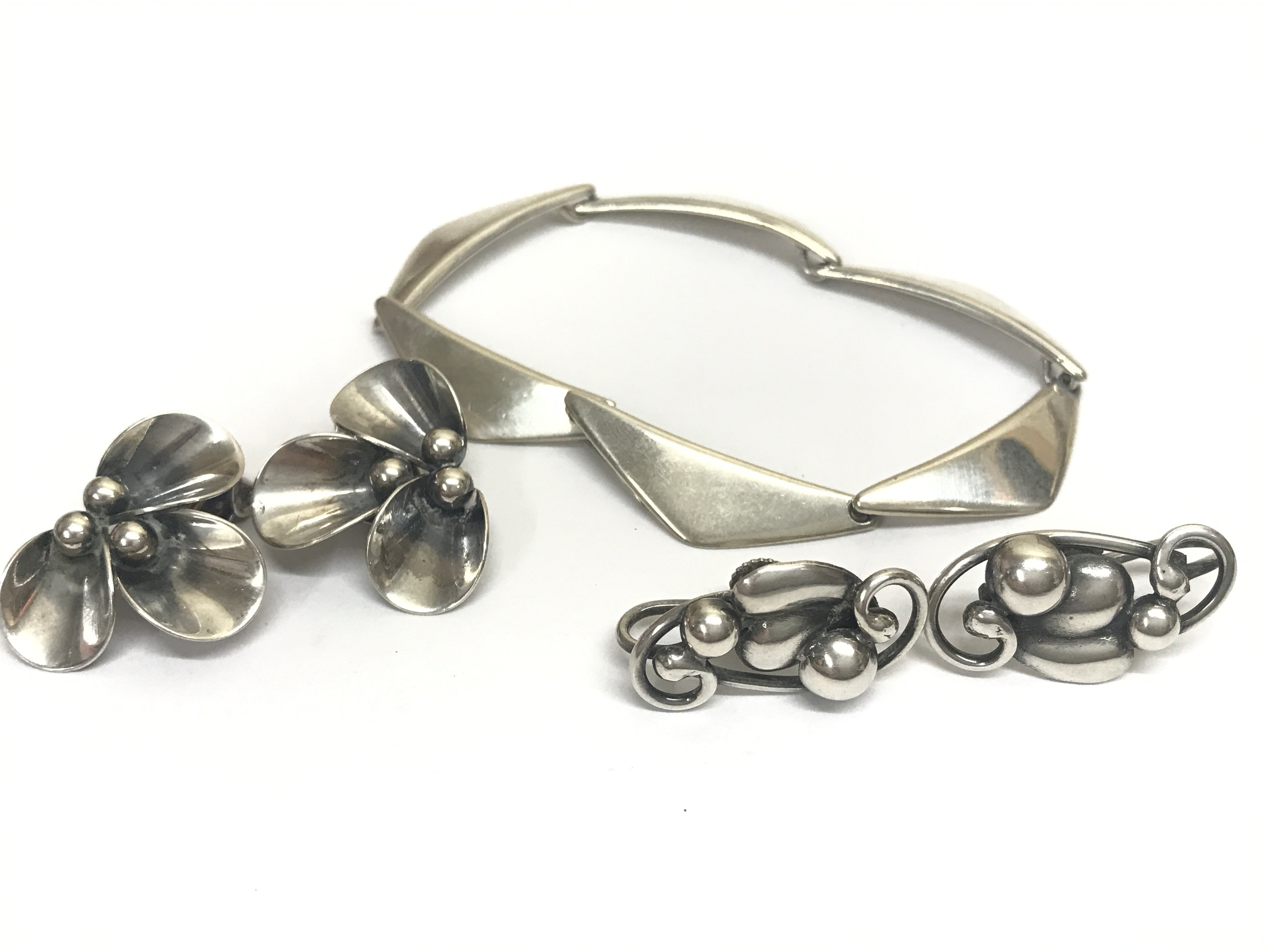 Two pairs of modern Danish silver earrings and a Hans Hanson Danish silver bracelet . Postage category A
