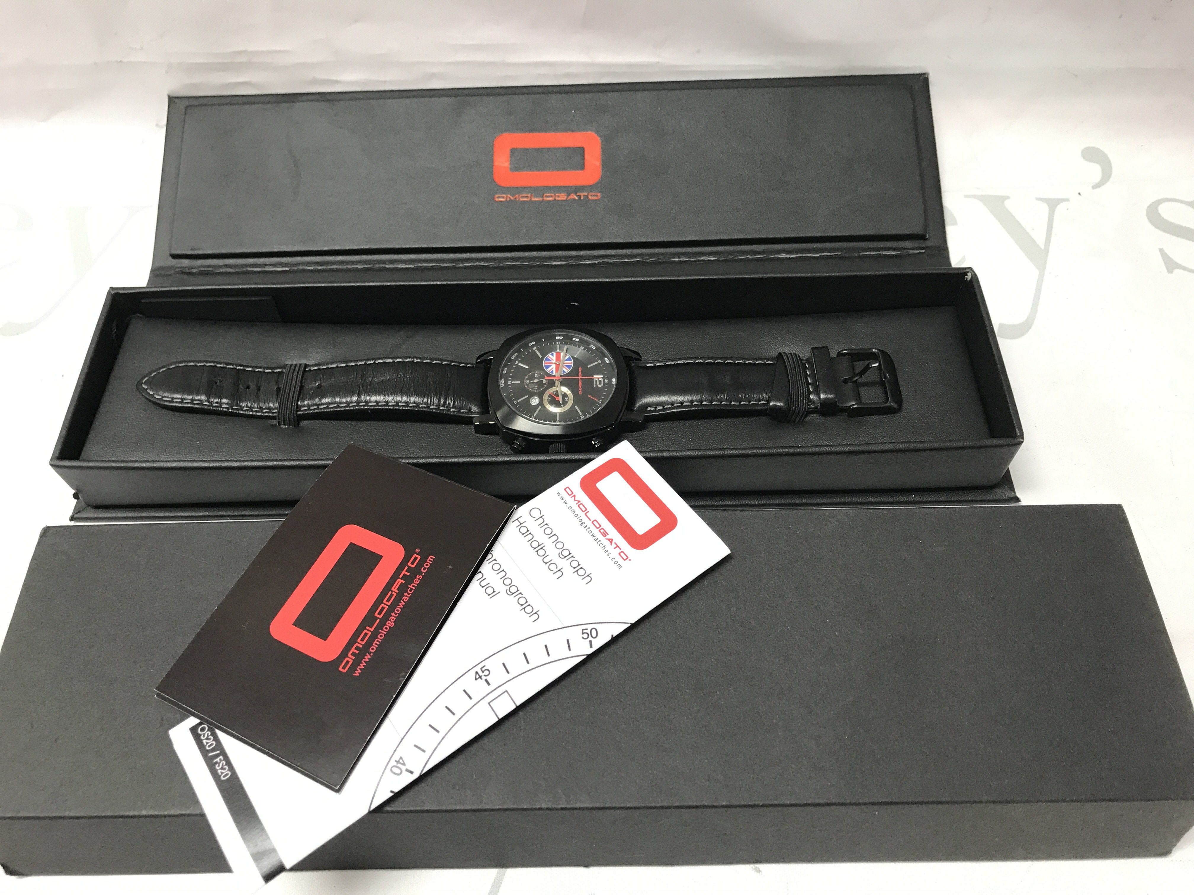 A boxed Omologato Mahindra Racing Formula E team Gents wrist watch. Postage category B
