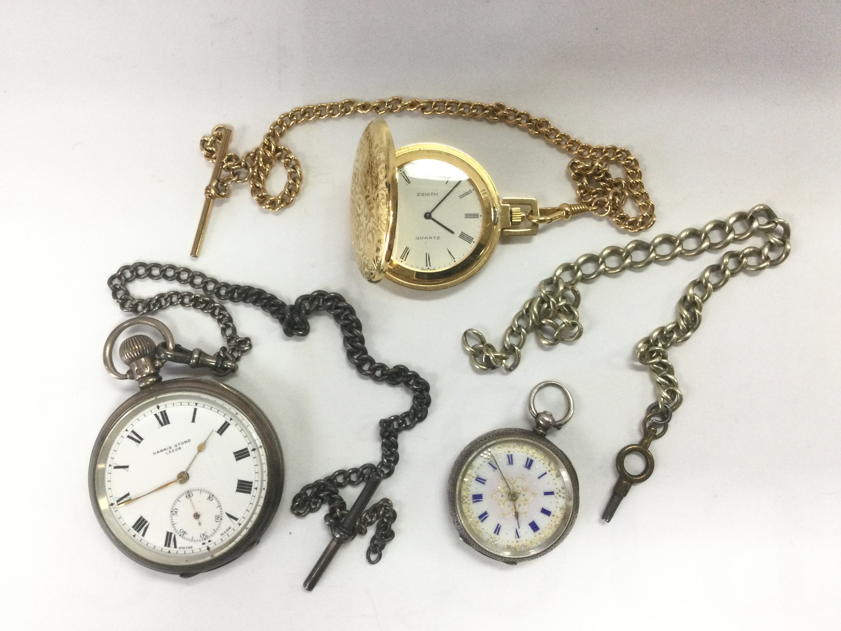 Three pocket watches including two silver cased examples. Shipping category B.