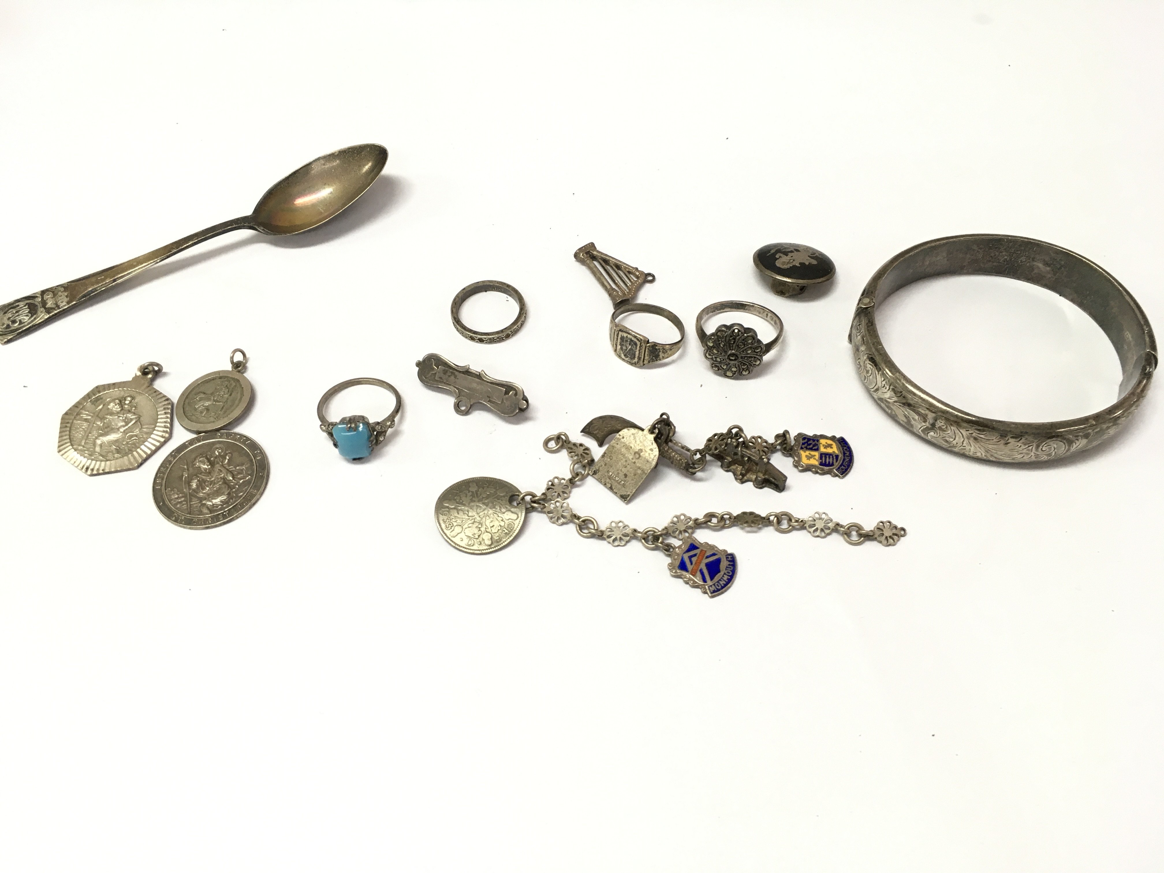 A small collection of silver items including pendants rings etc approx 70g total.