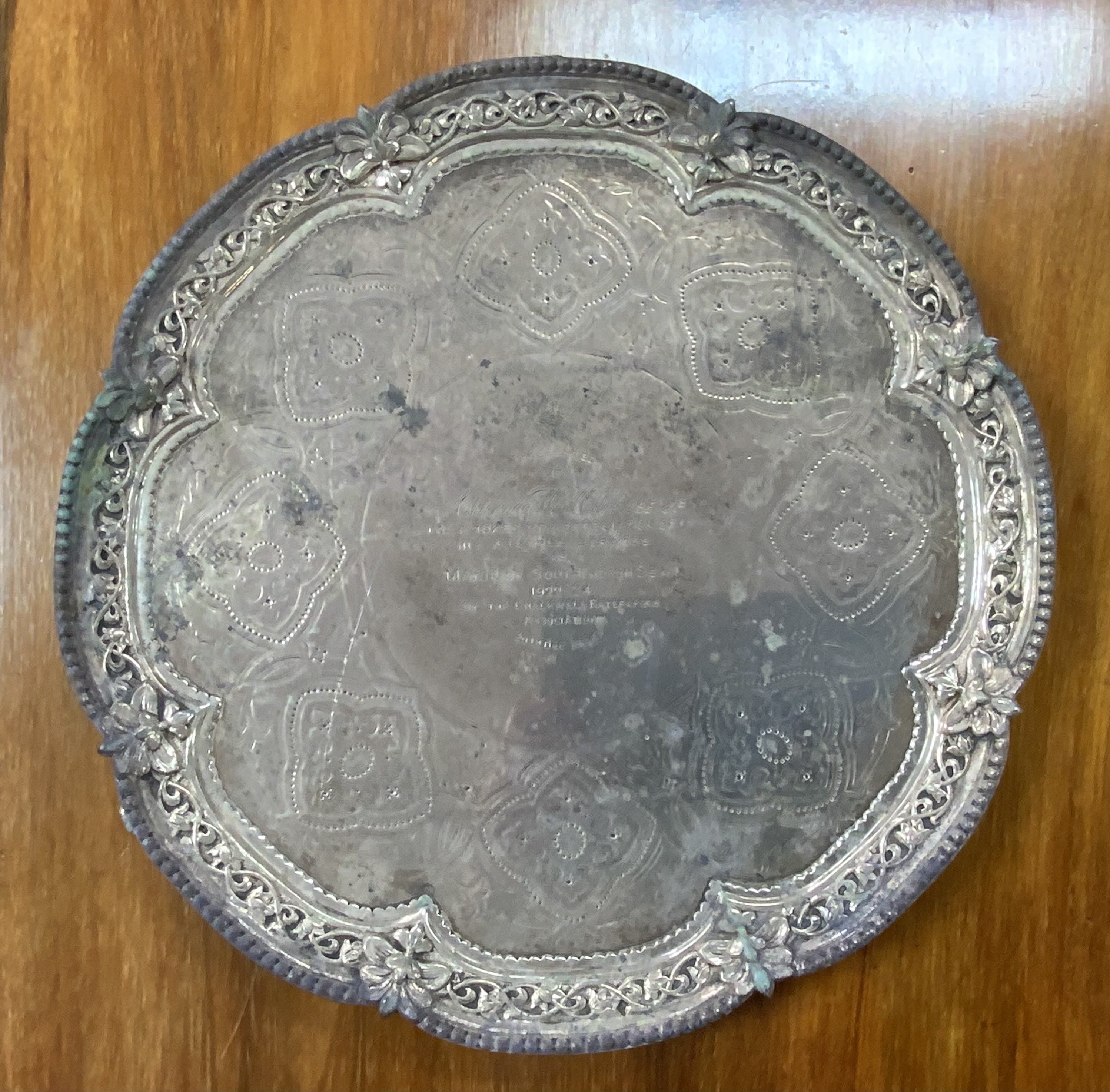 A large 3 footed hallmarked (George Angell & Co, London 1917) silver tray, 1445g, Diameter 35cm x Height 3.5cm. (From the estate of Alderman W Miles ref lot 701), presented as a token of appreciation.