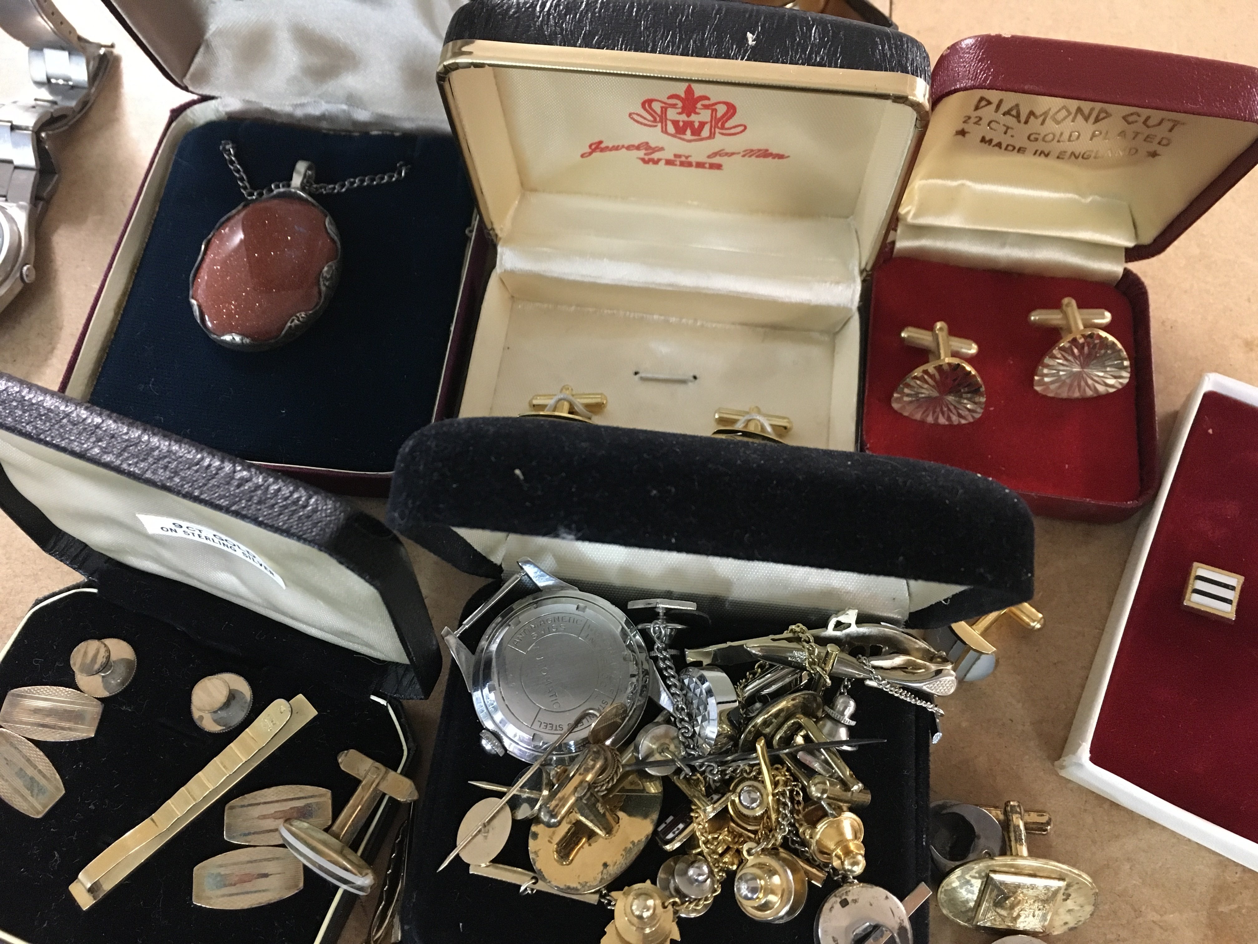 A collection of cufflinks a silver pendant on chain and two watches.- NO RESERVE