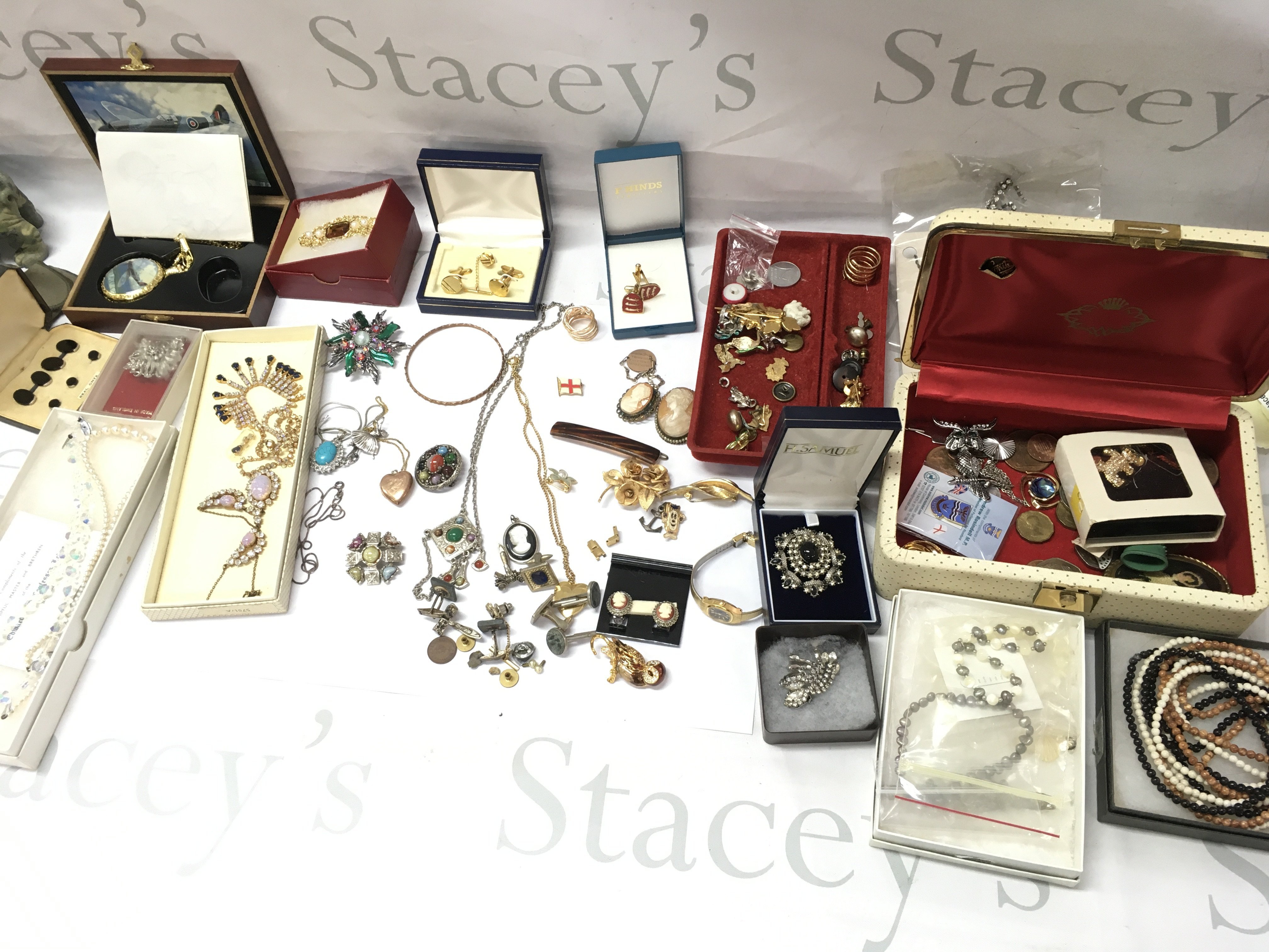 A collection of assorted costumes jewellery including onyx cufflinks and silver items. Postage B