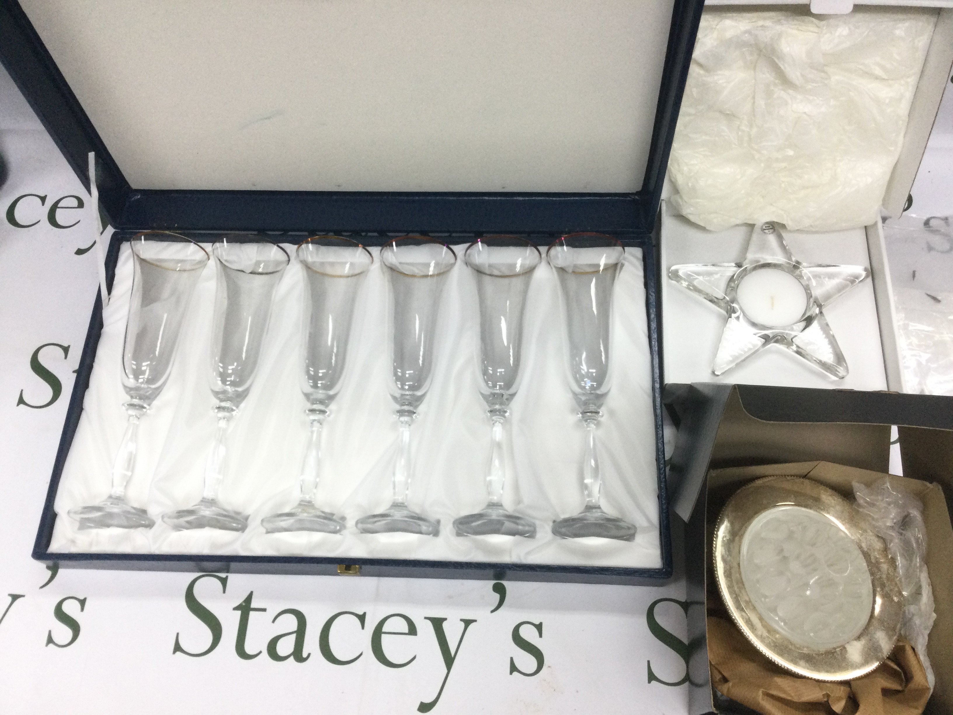 A collection of silver plated items plus some glassware. Shipping category D.- NO RESERVE