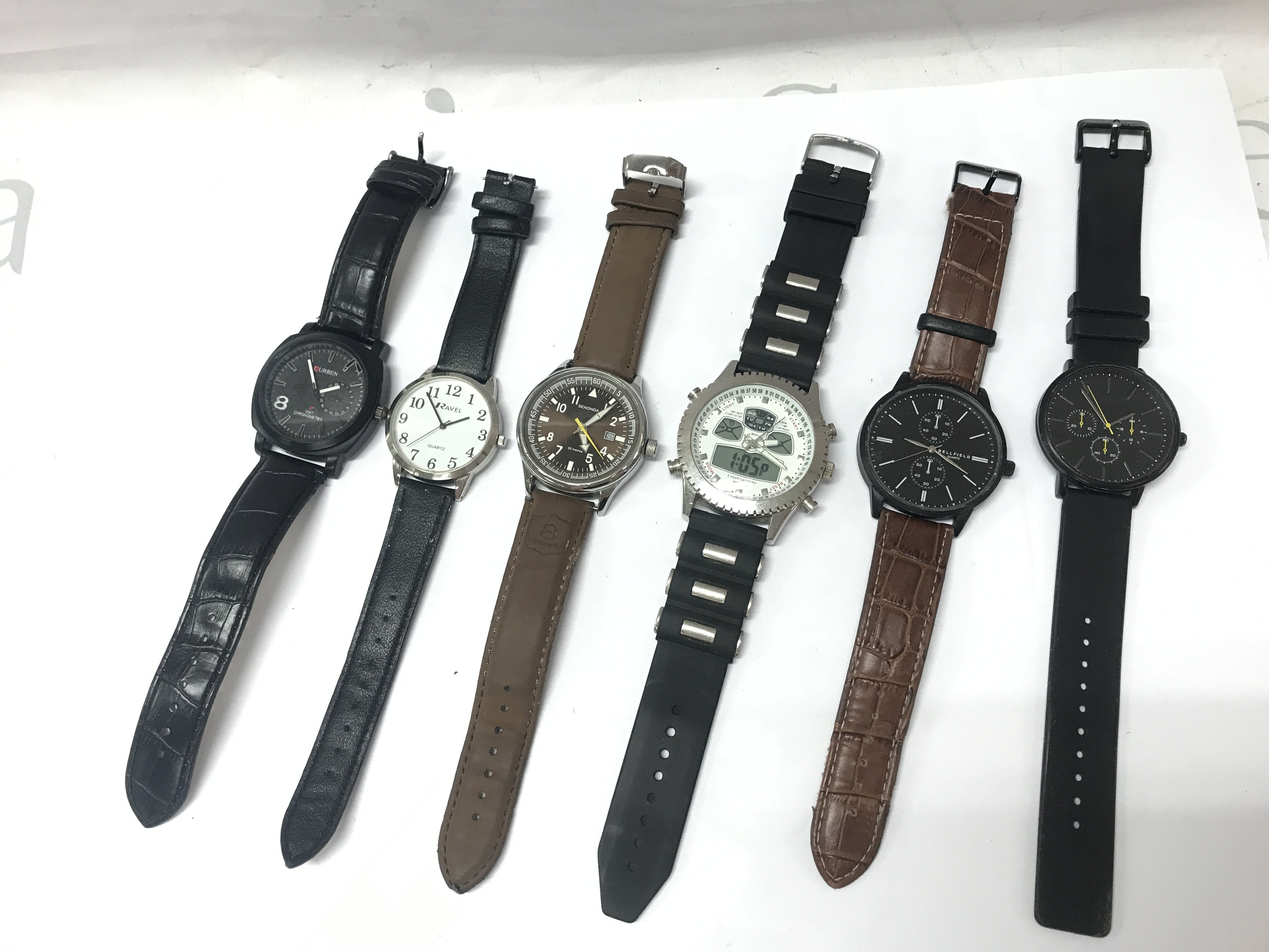 Six Gents watches including Sekonda, Bellfield etc. all working . Postage category a