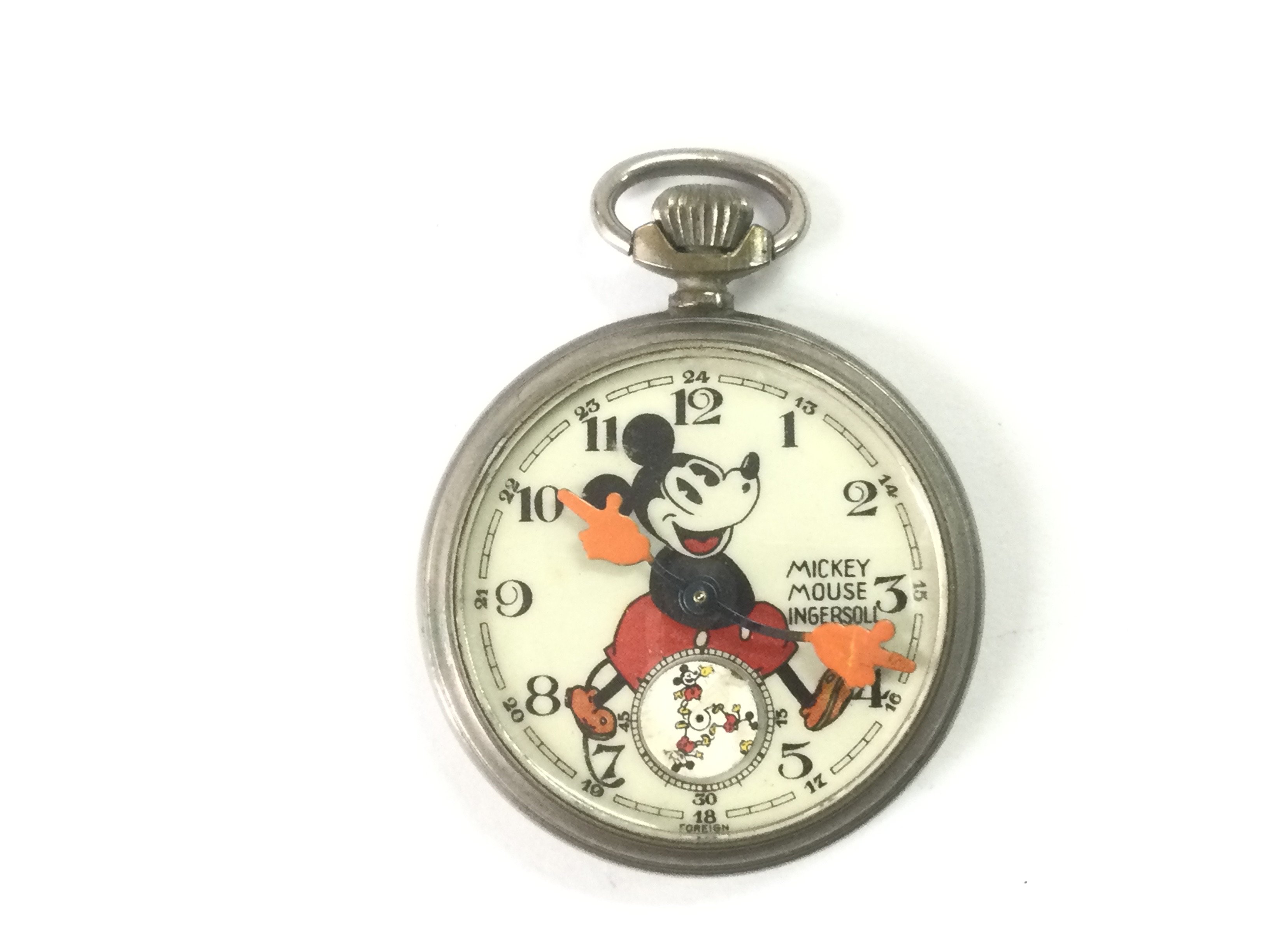 A vintage Ingersoll Mickey Mouse pocket watch. Shipping category A.