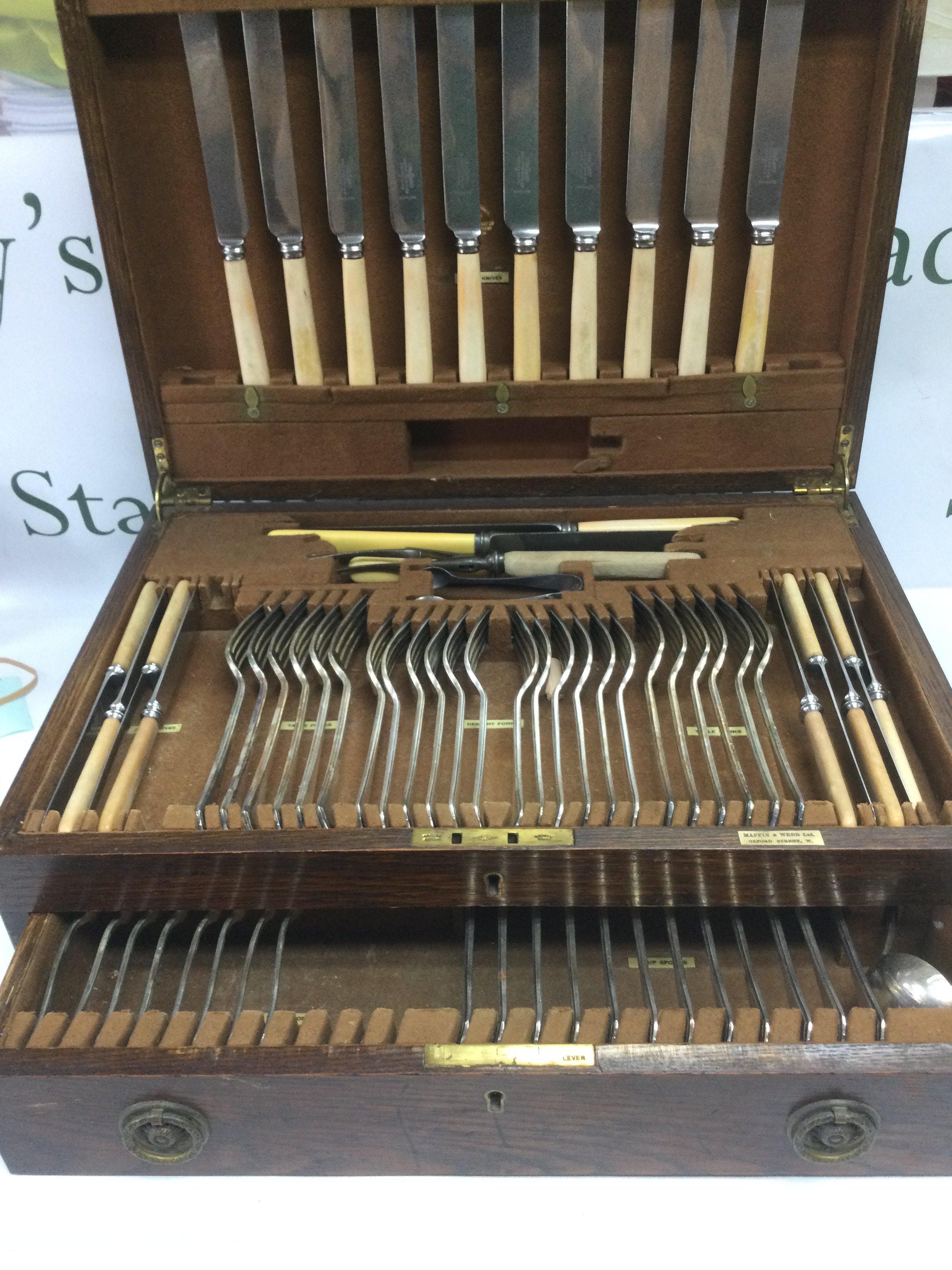 A circa 1930s oak cased Mappin & Webb cutlery set. Shipping category D.